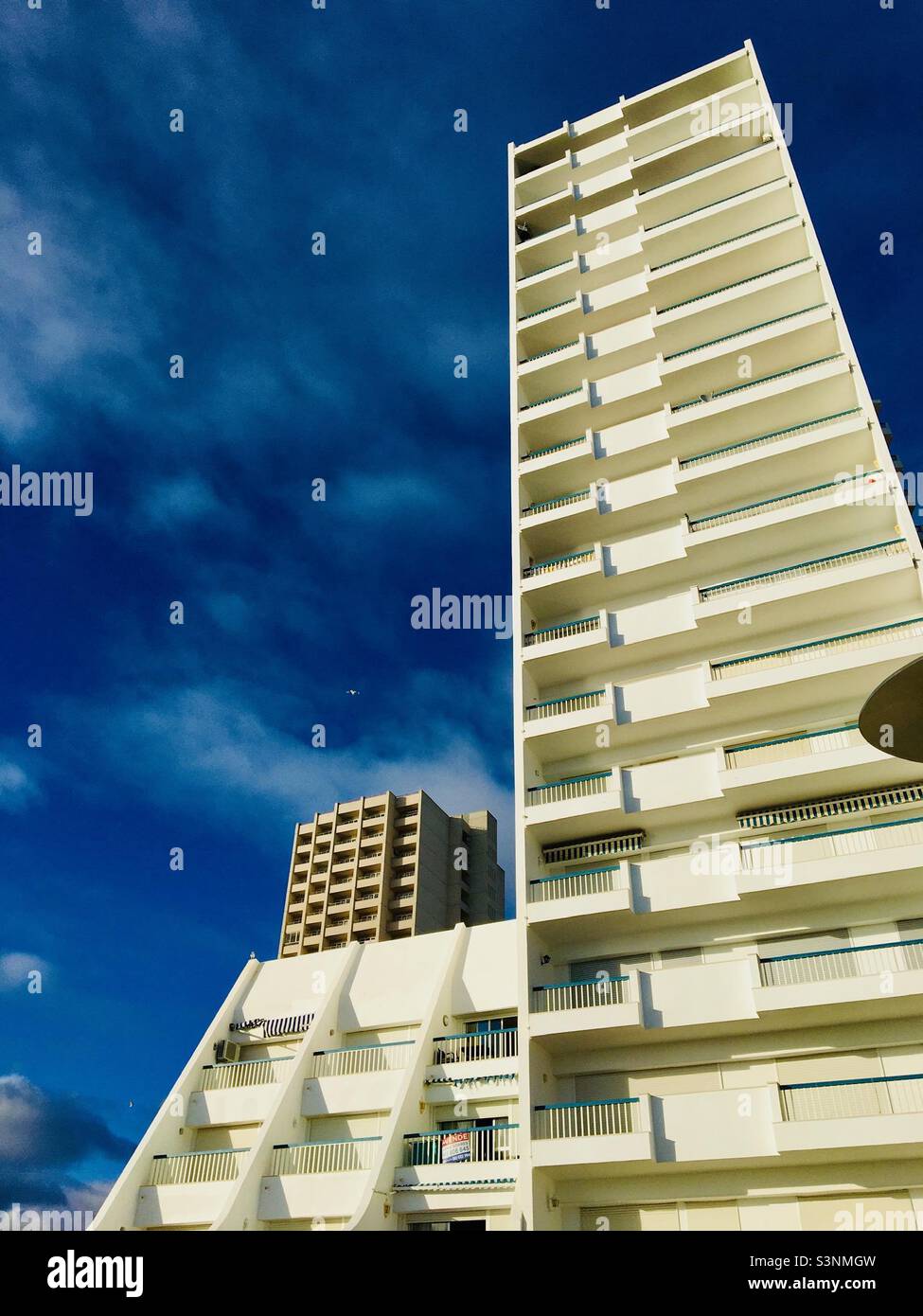 Skyscraper in Portimão at the beautiful Algarve with clauded sky. Stock Photo