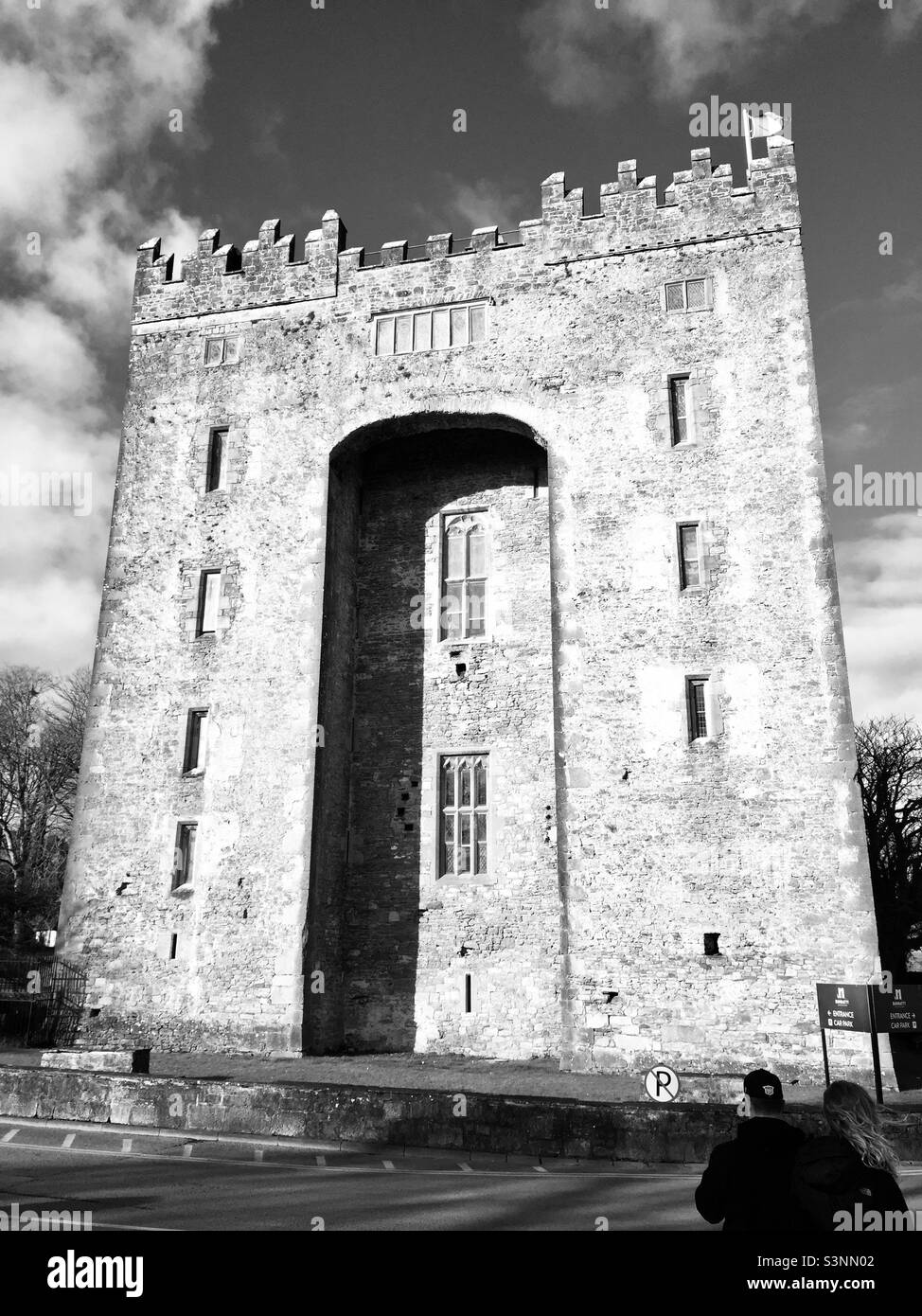 Bunratty Castle in black and white on a mostly sunny day. - Smartphone Captured Stock Image