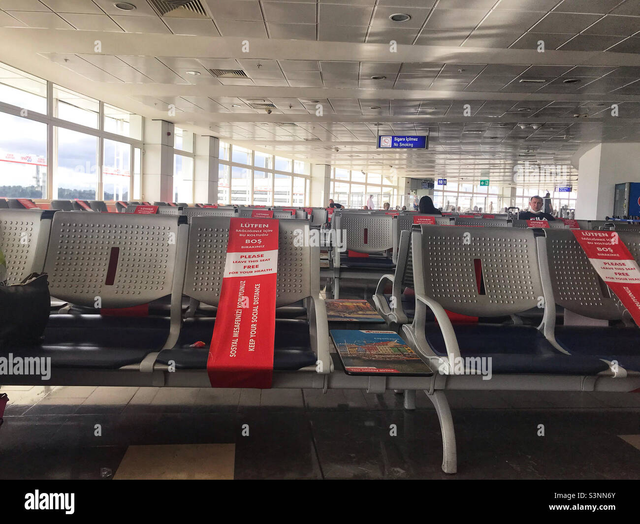 Turkey Antalya airport departures seating with social distancing red