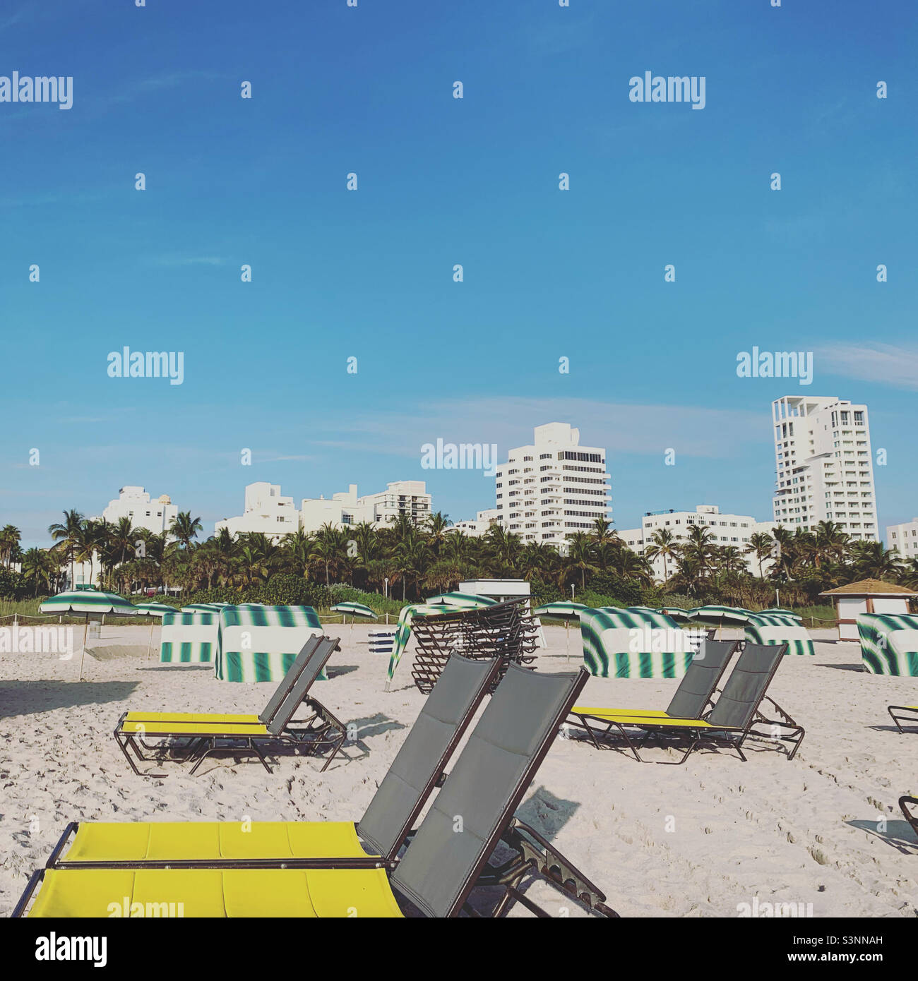 January, 2022, Lounge chairs on the beach, South Beach, Miami Beach, Florida, United States, North America - Smartphone Captured Stock Image