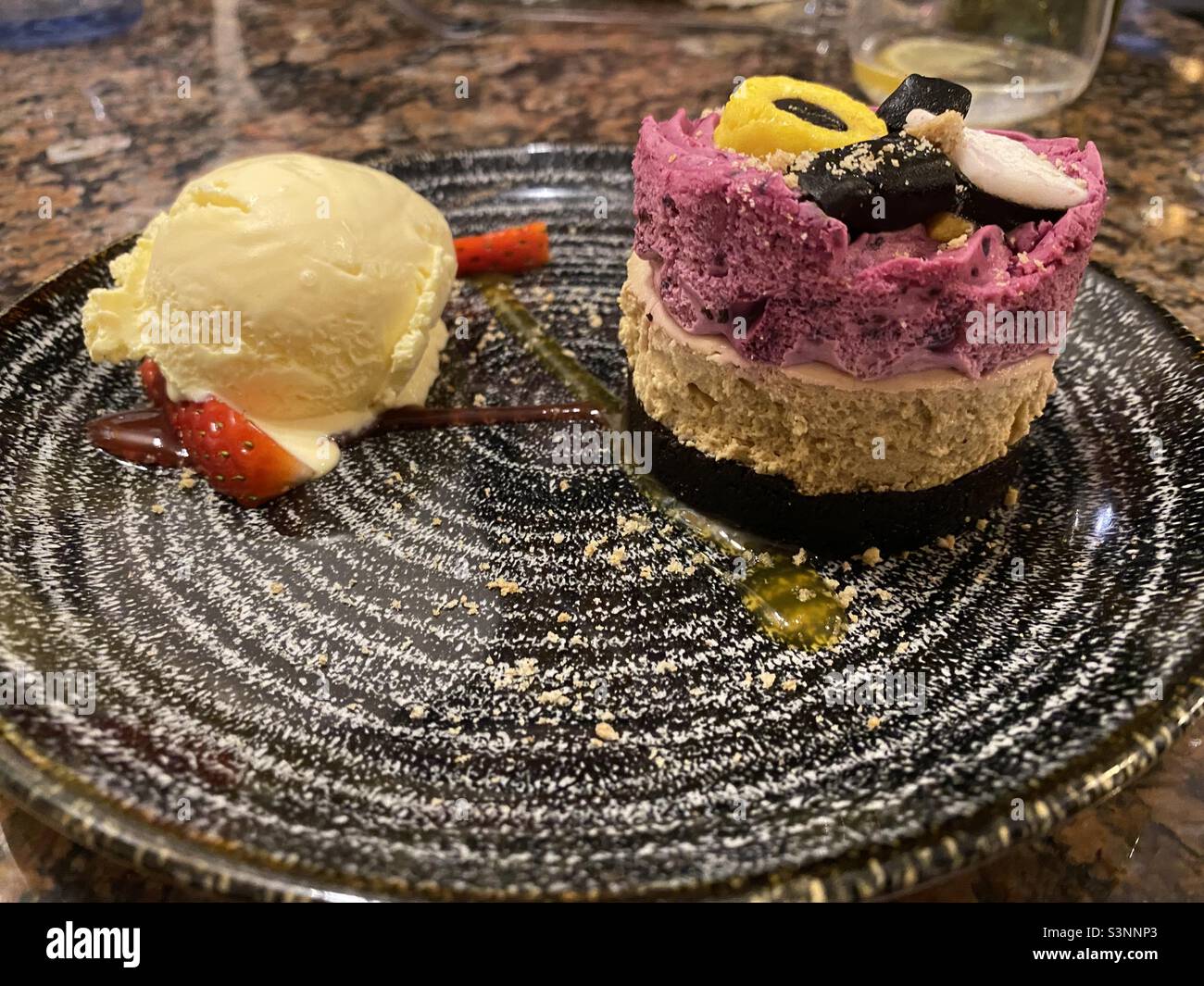 Blackcurrant and Licorice Cheesecake with Vanilla Ice cream and