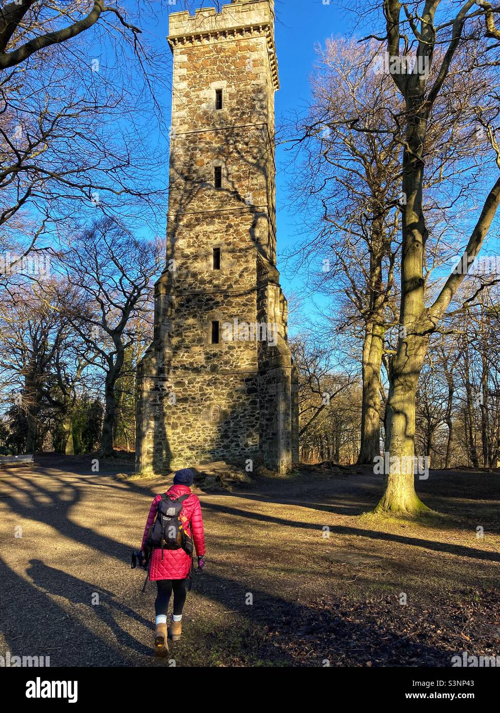 Walker at Corstorphine Hill Tower, Corstorphine hill, Edinburgh - Smartphone Captured Stock Image