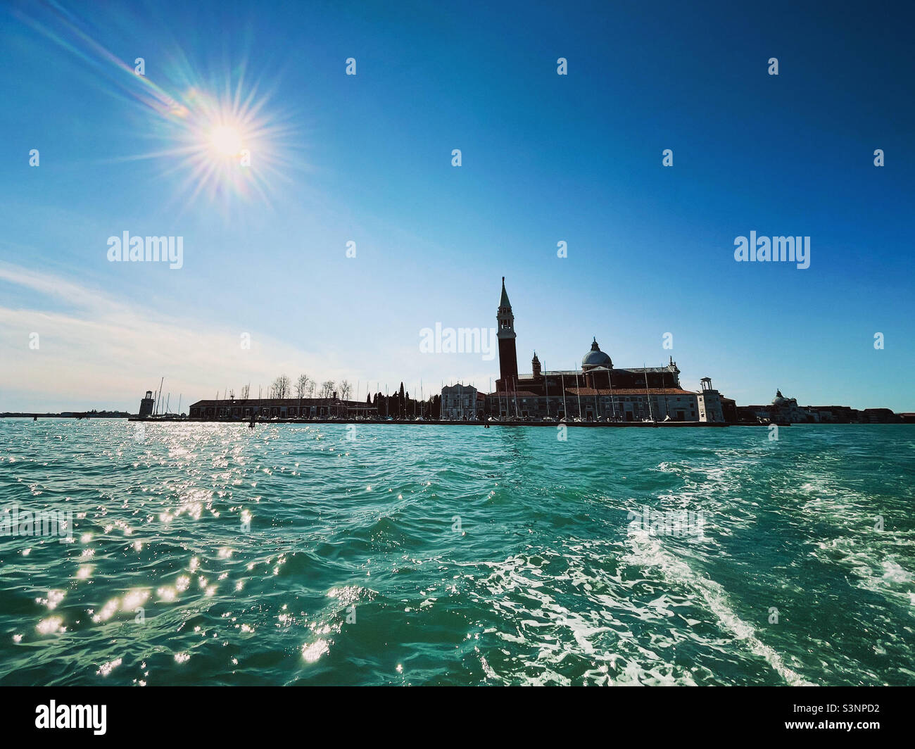 Venice Italy; the Chiesa di San Giorgio Maggiore in the distance photographed from the water on a sunny winter day. - Smartphone Captured Stock Image