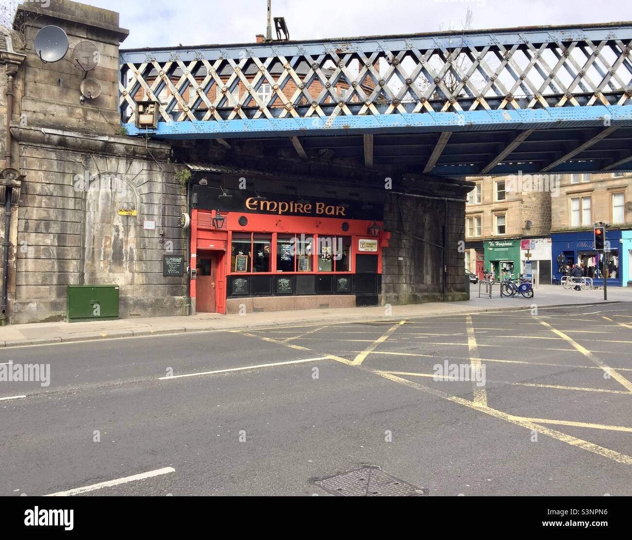 The old Empire Pub under a rail bridge over Saltmarket in Glasgow. - Smartphone Captured Stock Image