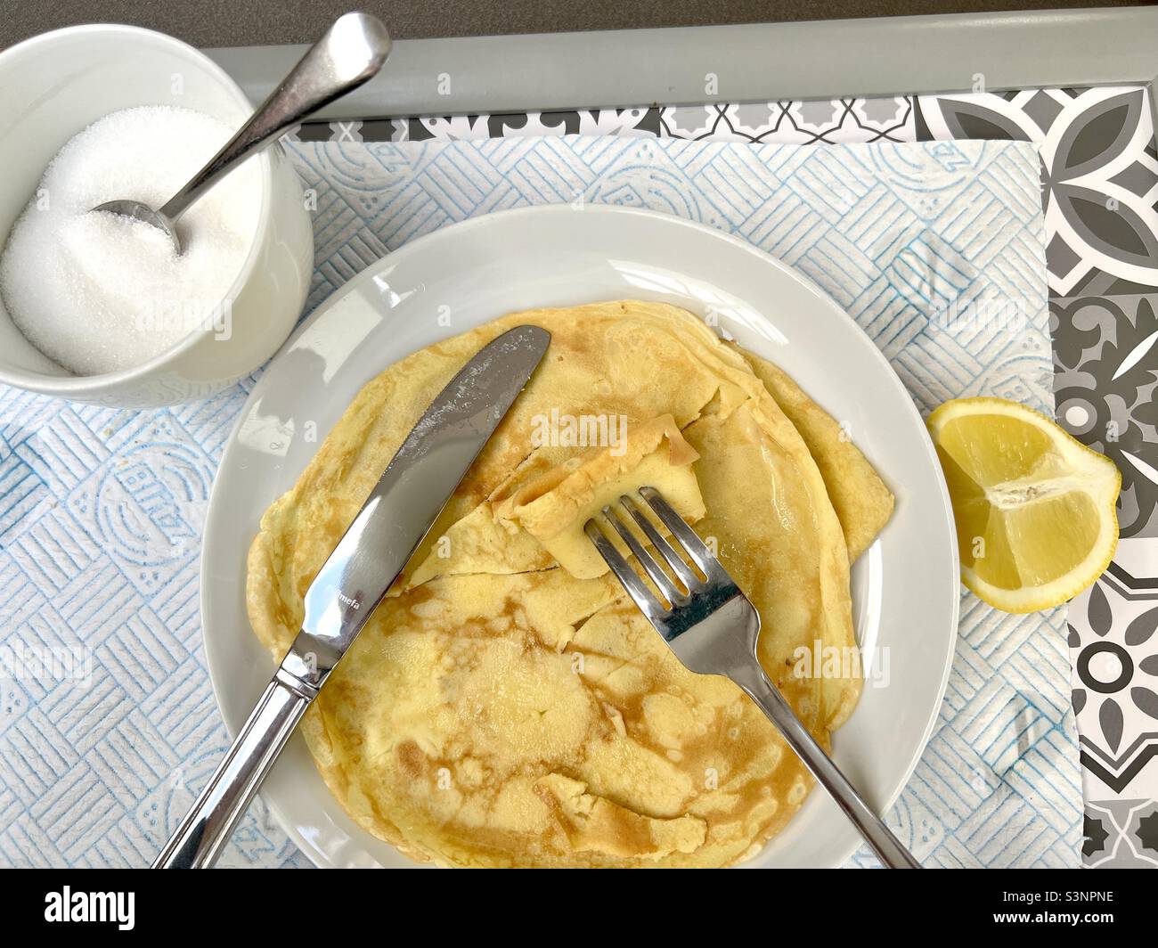 Pancakes with sugar and lemon Stock Photo