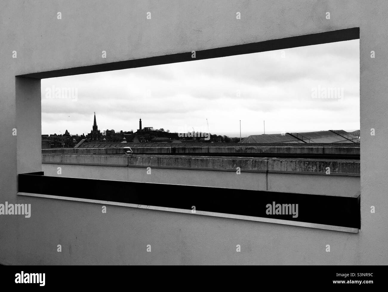 From the rooftop of the National Museum of Scotland the Edinburgh skyline in black and white. - Smartphone Captured Stock Image