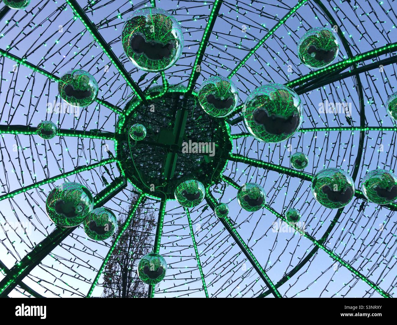 Hanging green bauble Christmas display outside - Smartphone Captured Stock Image