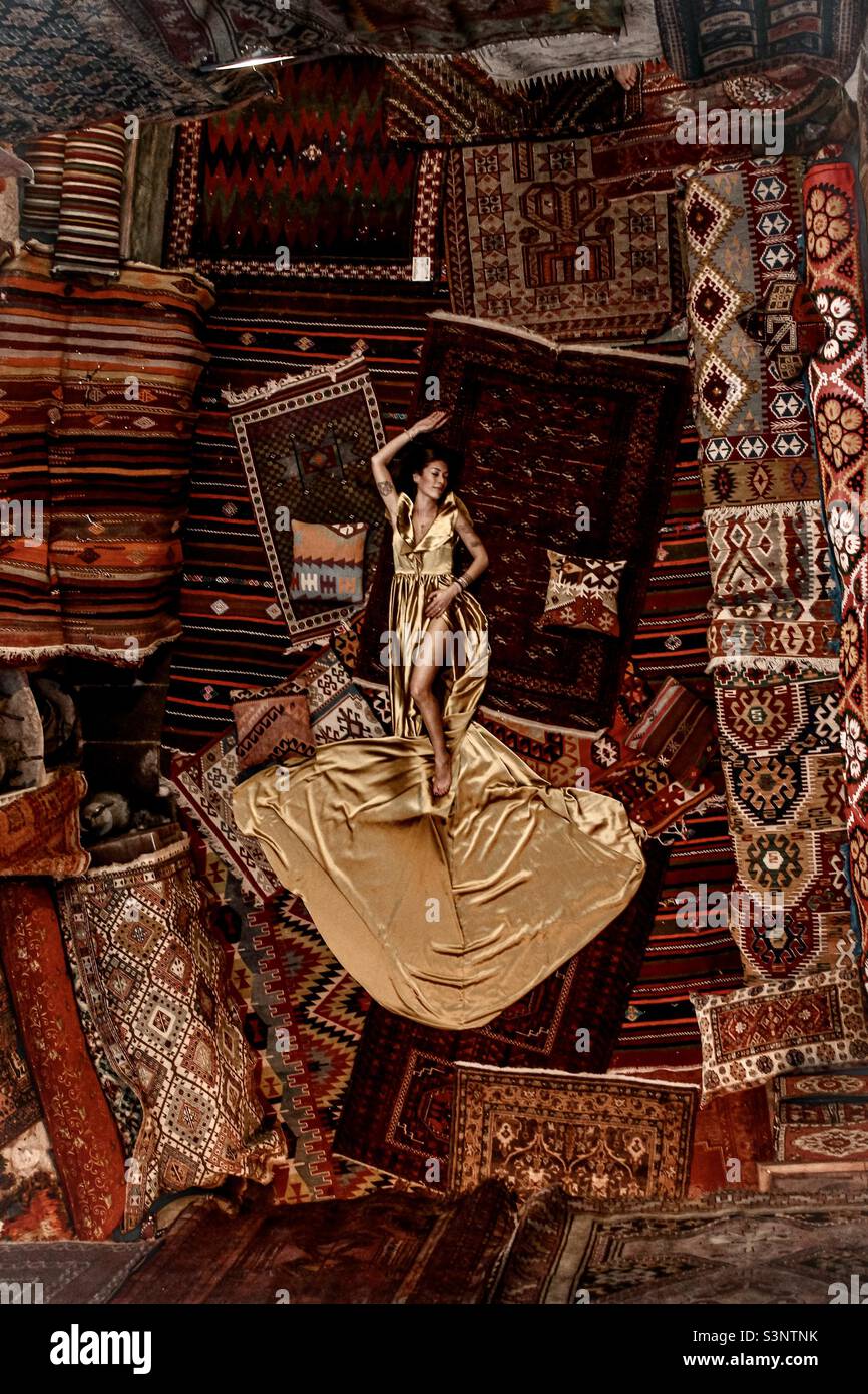 Girl laying down carpet Stock Photo Alamy