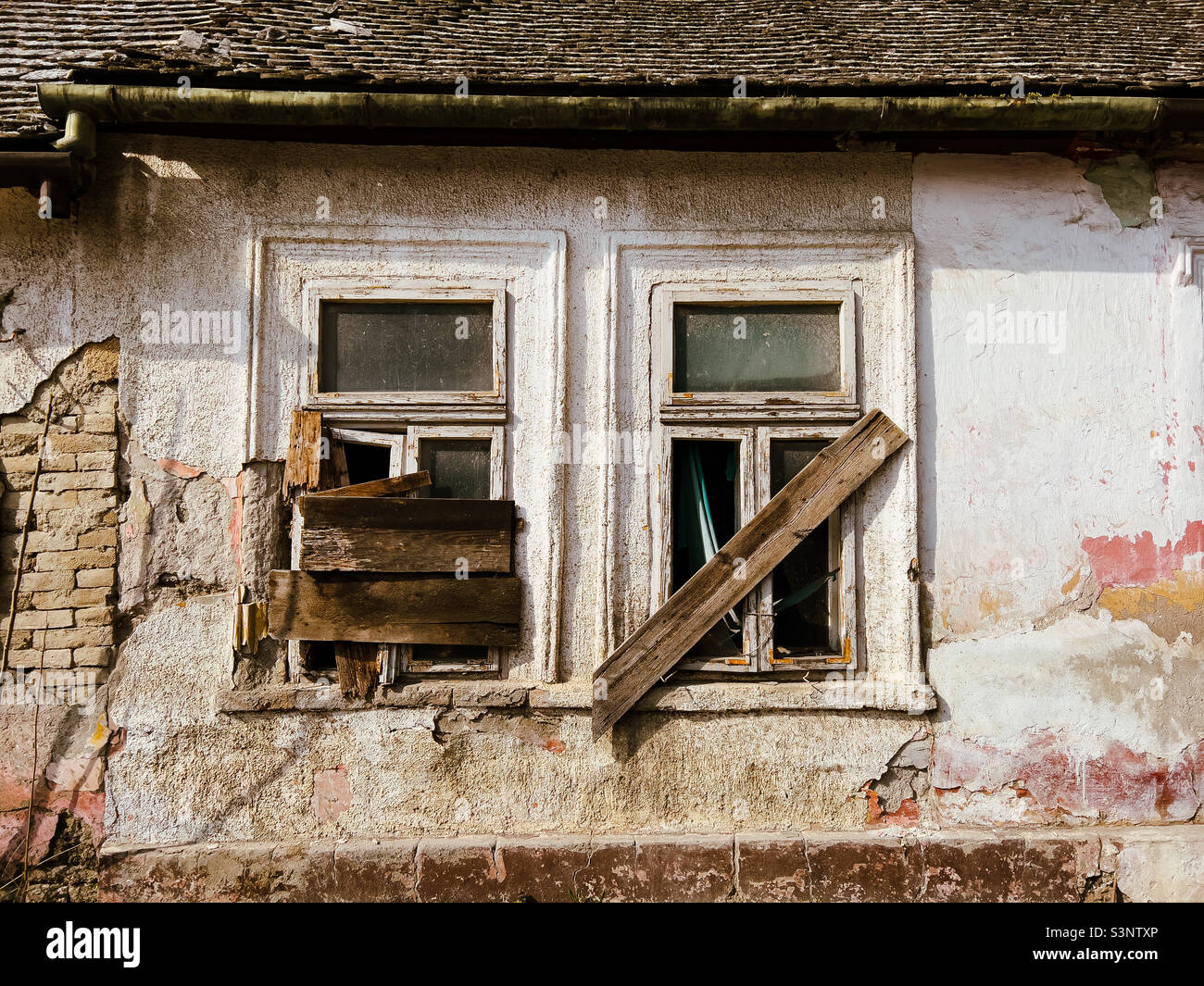 Old abandoned ruined house with broken windows - Smartphone Captured Stock Image