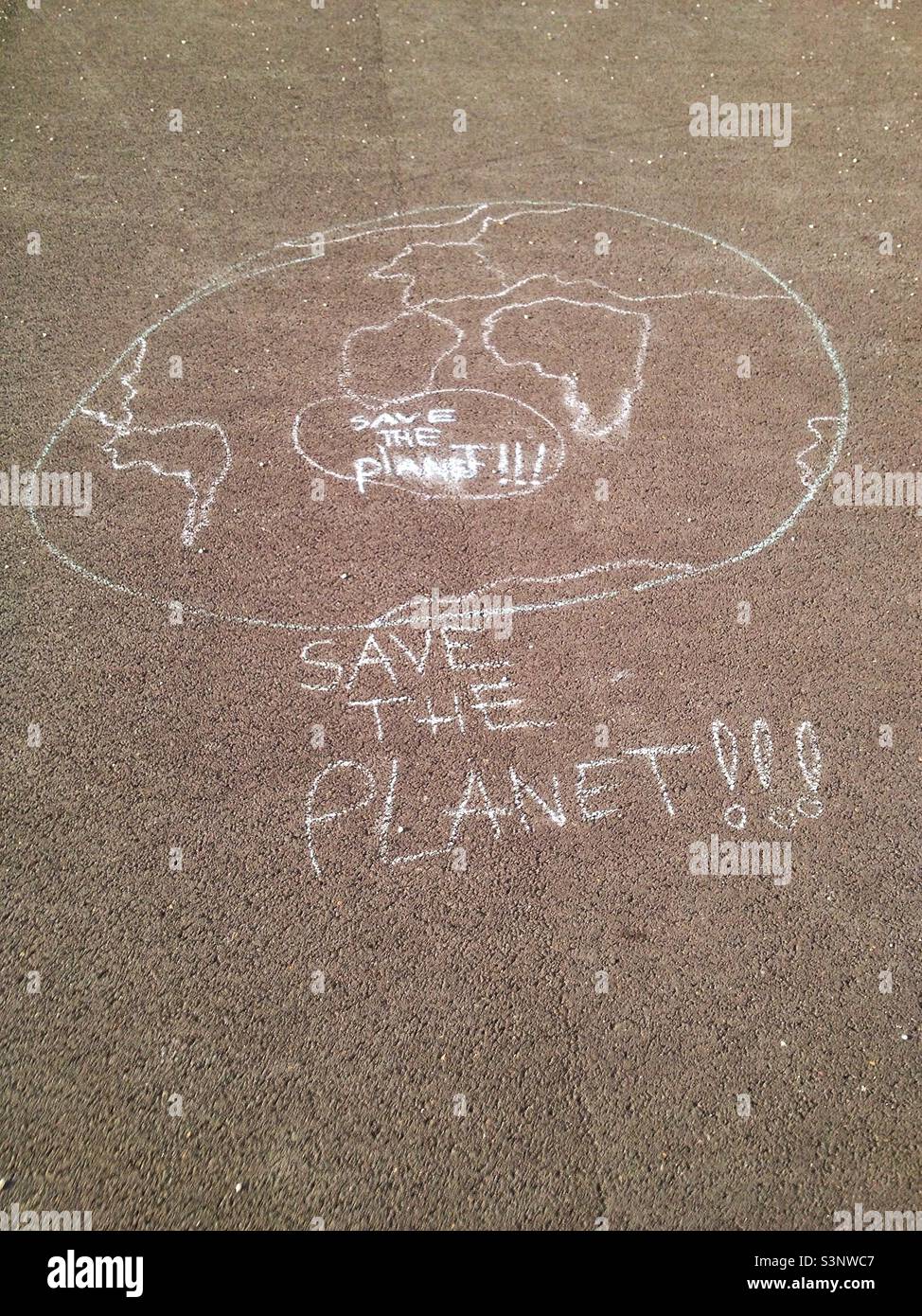 Chalk drawing : Save the planet - Smartphone Captured Stock Image