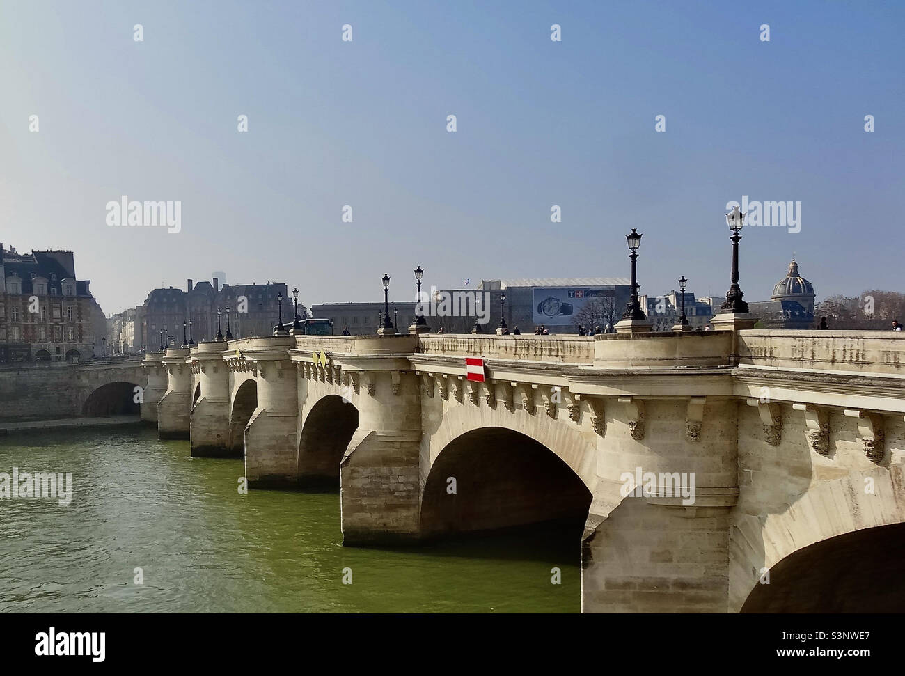 The Pont Neuf (New Bridge: 1578-1607) over the River Seine in Paris, the oldest city bridge and linking the Right and Left Banks. It has undergone much repair and rebuilding over time. Stock Photo