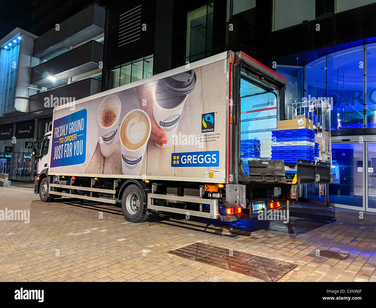Greggs lorry unloading goods late night in Leeds Stock Photo