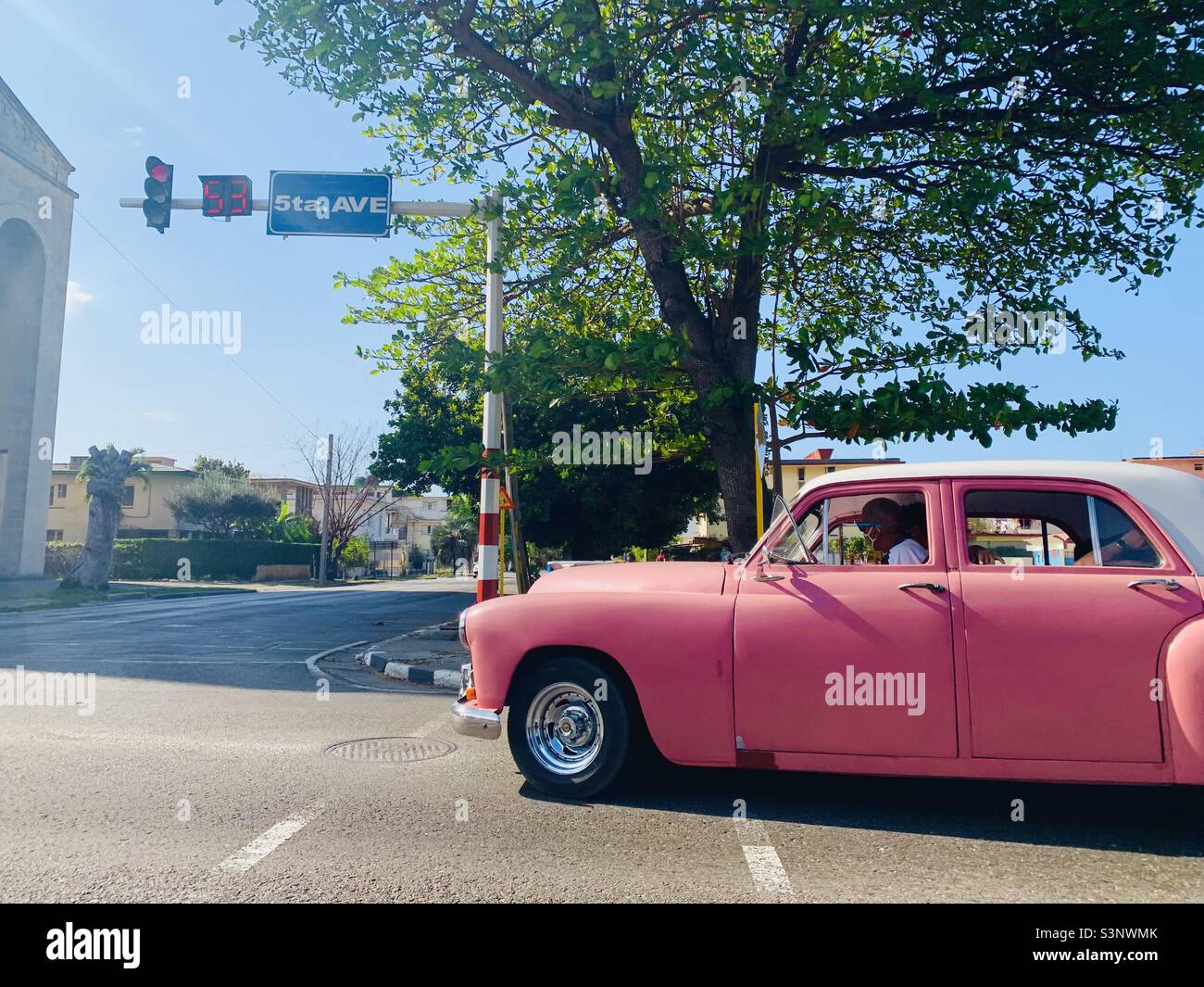Old classic American car also called ‘Almendron’ on Havana’s 5th avenue, March 2022, Miramar, Havana, Cuba - Smartphone Captured Stock Image