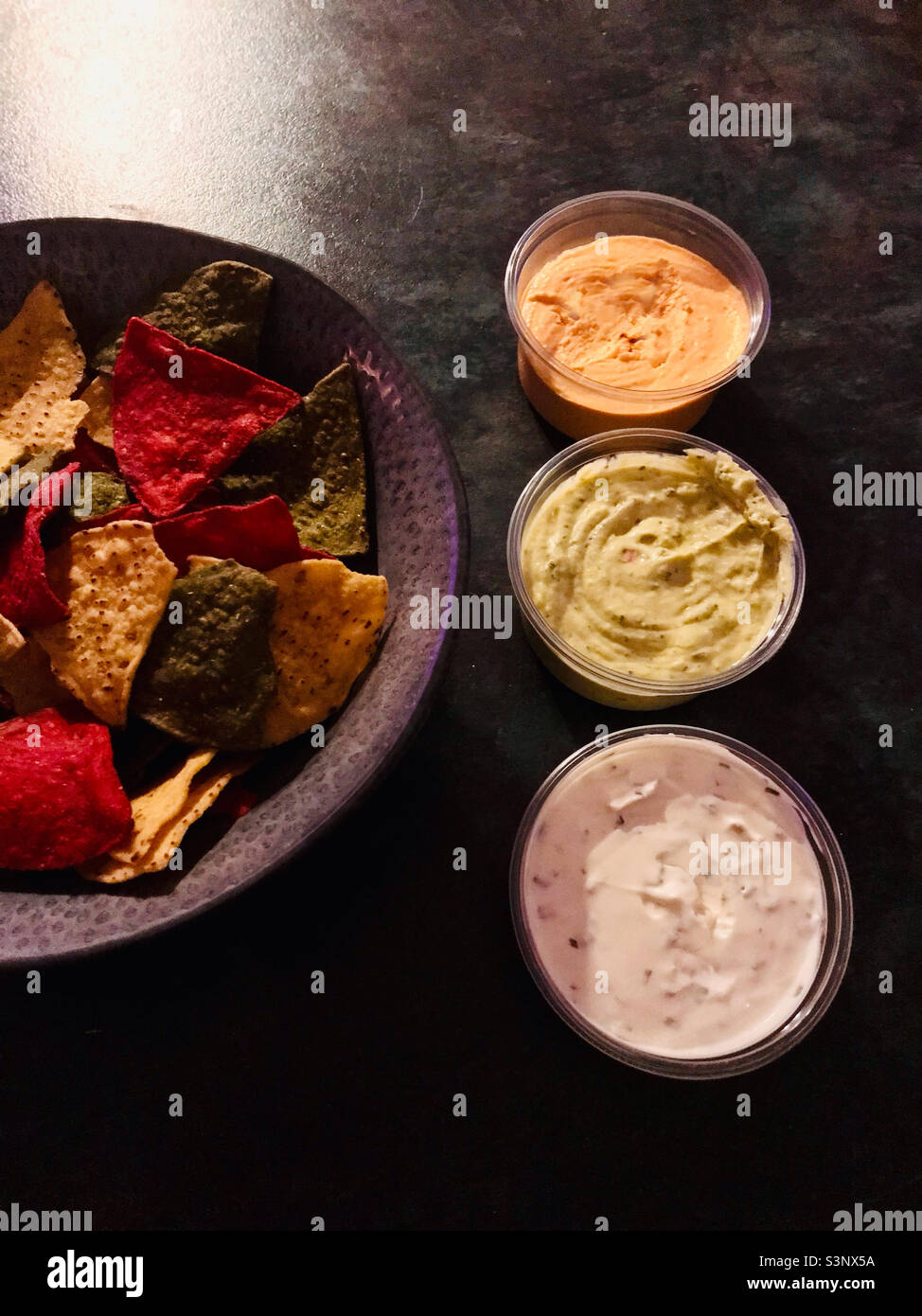 Vegetable tortilla chips with dips Stock Photo Alamy