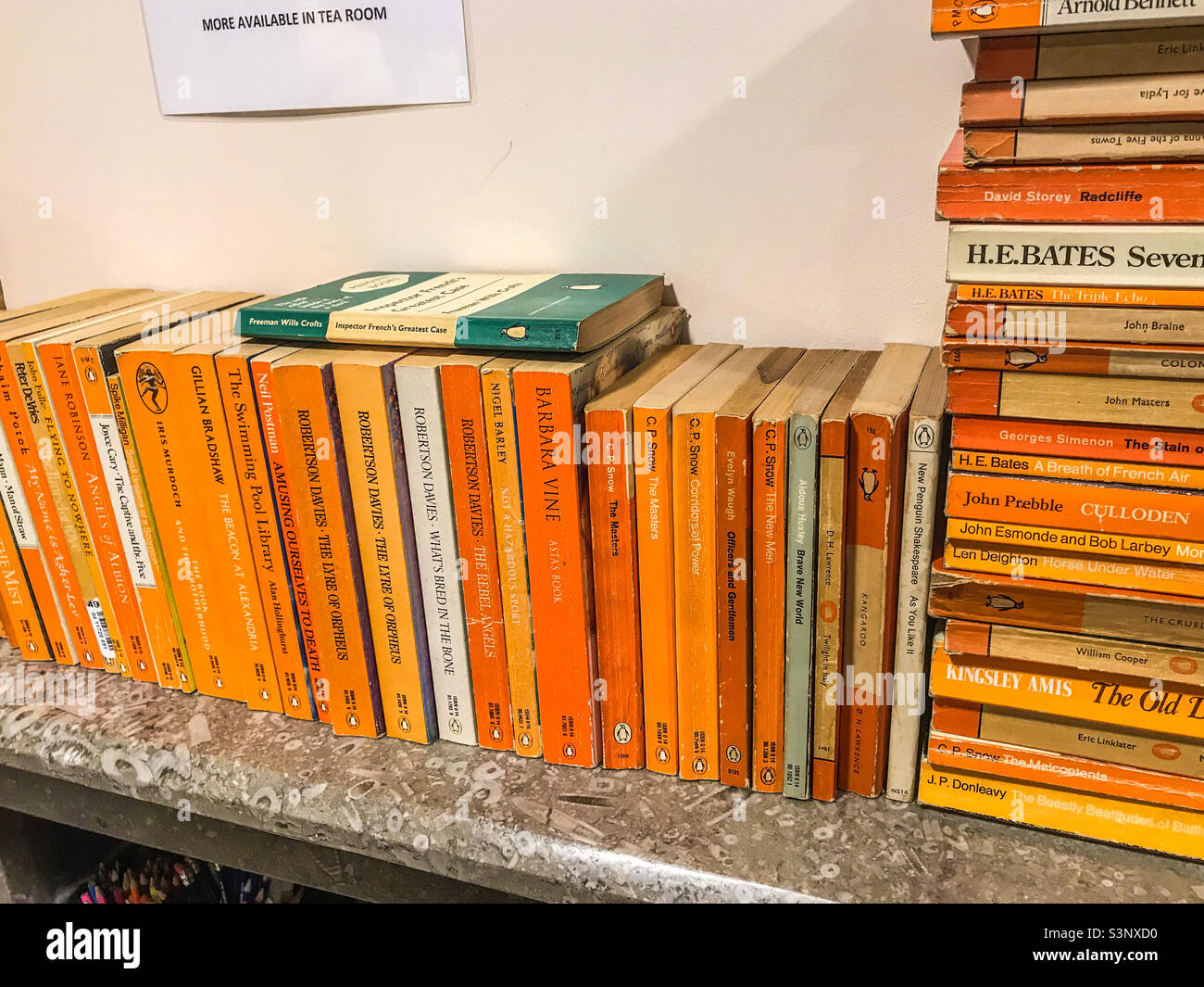 Orange penguin books Stock Photo