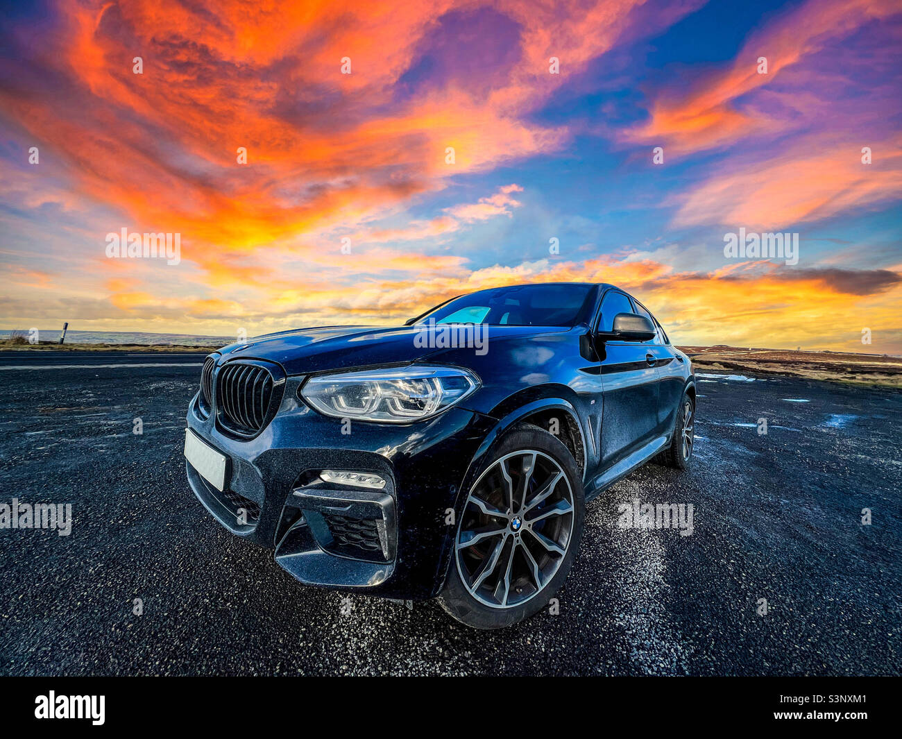 BMW X4 M40i SUV in North York Moors National Park in North Yorkshire - Smartphone Captured Stock Image