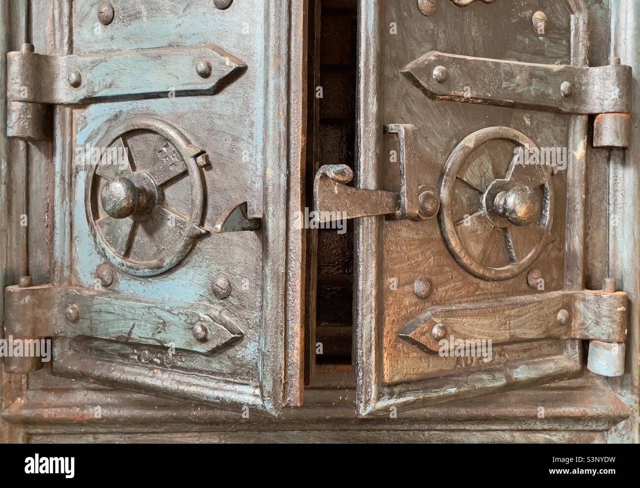 Cast iron furnace doors on display in the Museum of East Anglian life