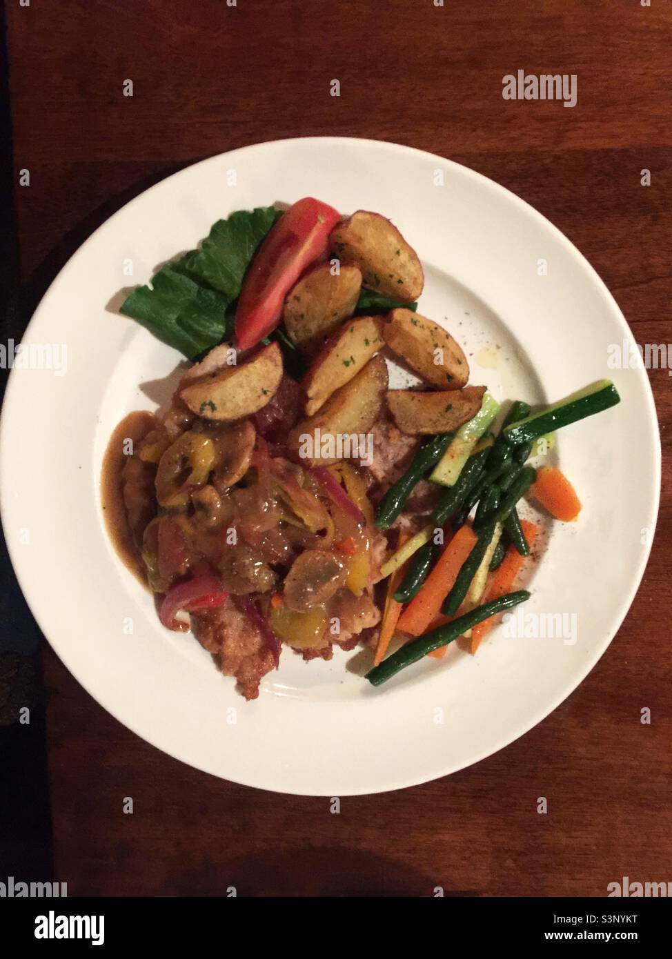 Balanced everyday meal: meat, potatoes, veggies. Daily chow. Principal meal. One of three square meals a day. Staple. Unpretentious. Adult Stock Photo