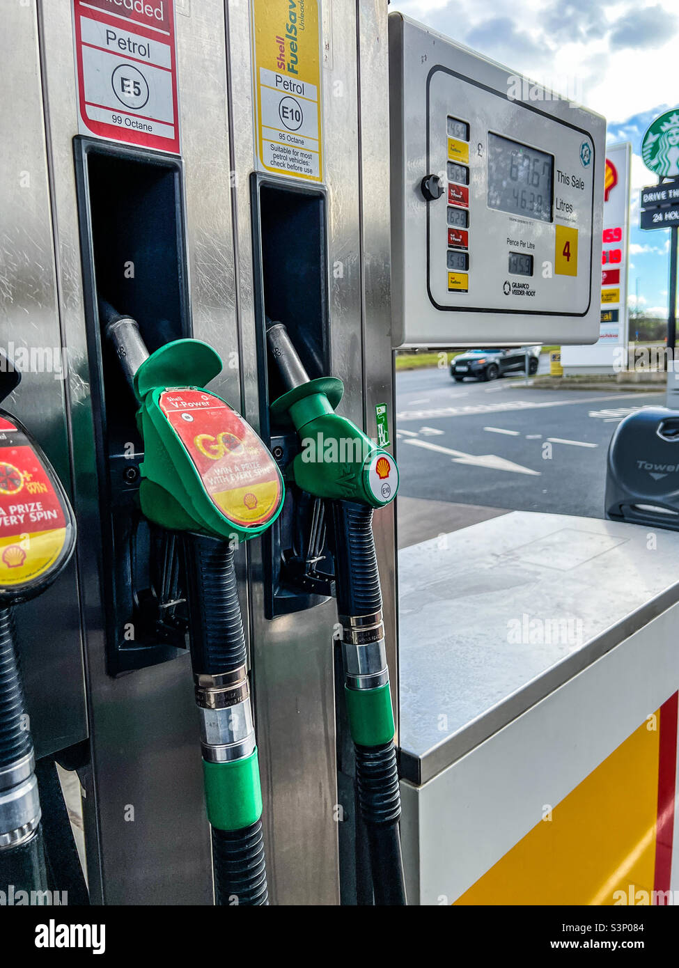 Unleaded petrol pumps at shell gas station Stock Photo