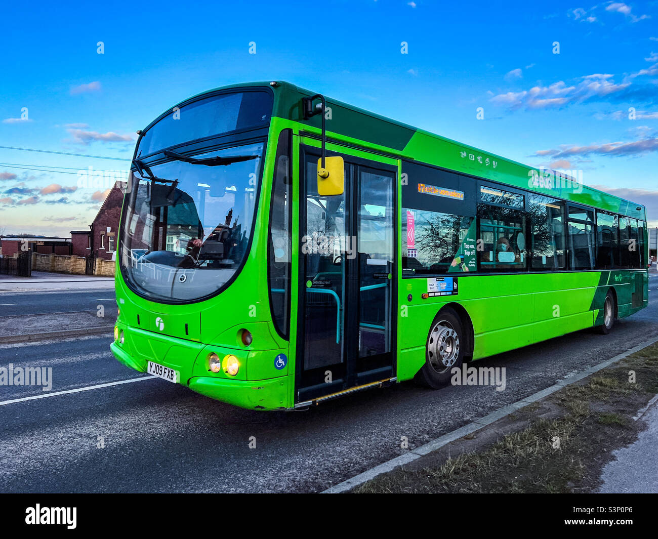 Green Leeds City bus in Leeds Stock Photo