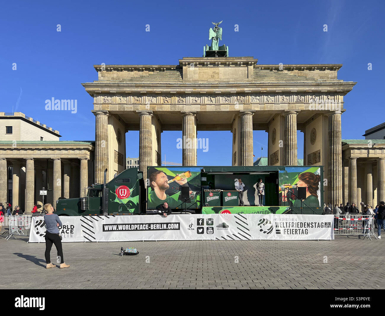 Appeal for World Peace at Brandenburg Gate during Russian Military invasion of Ukraine - Mitte, Berlin, Germany - Smartphone Captured Stock Image