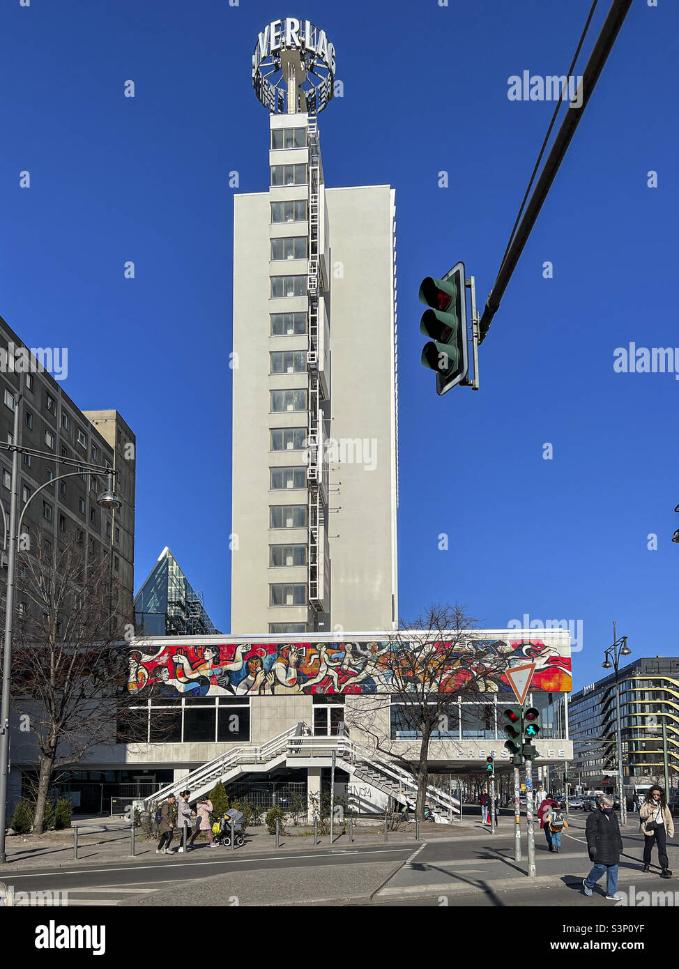 The Press cafe and newly exposed East German mural by Artist Willi Neubert - Karl-Liebknecht-Str. 29A Mitte,Berlin. - Smartphone Captured Stock Image
