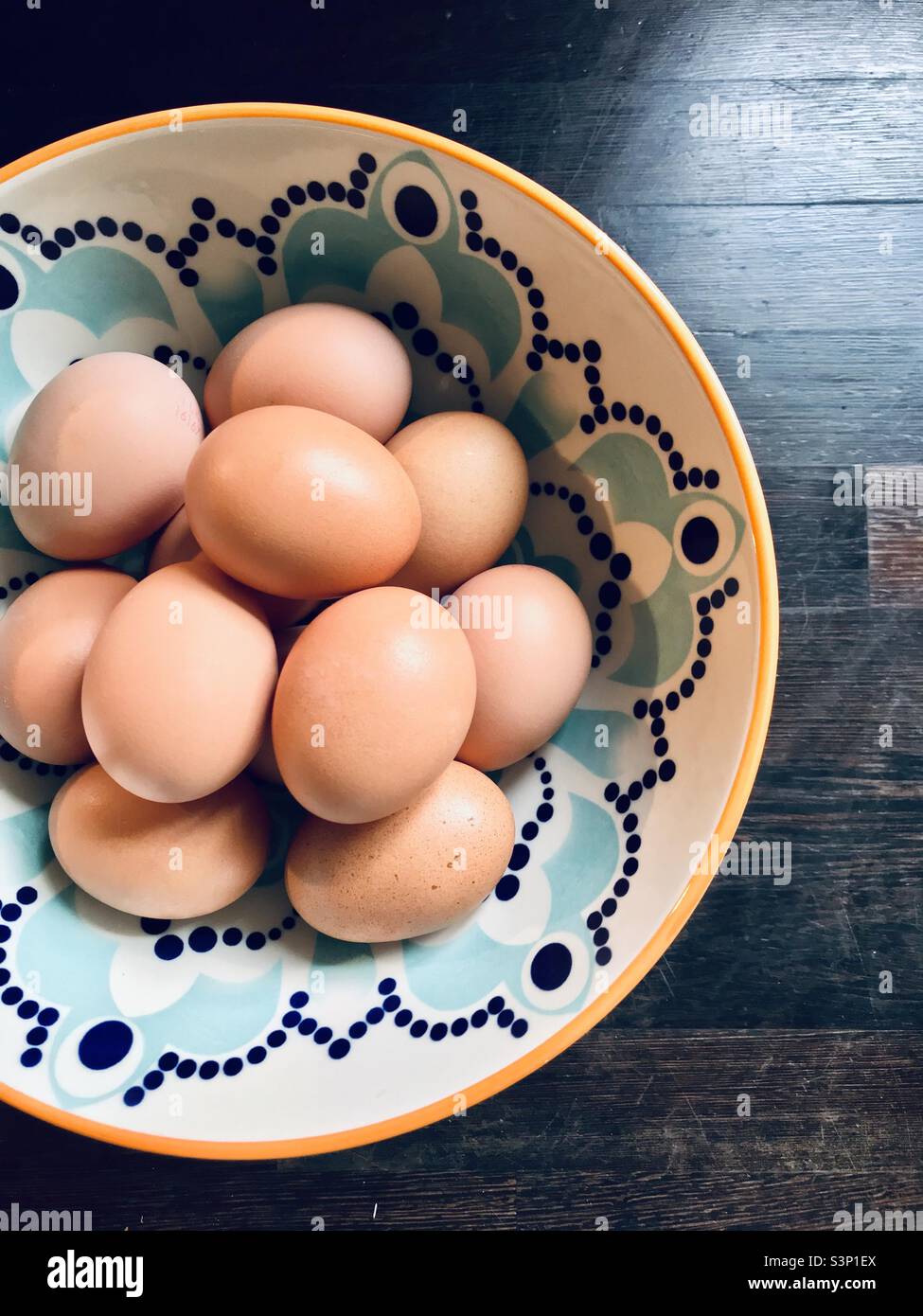 Decorative bowl filled with eggs Stock Photo