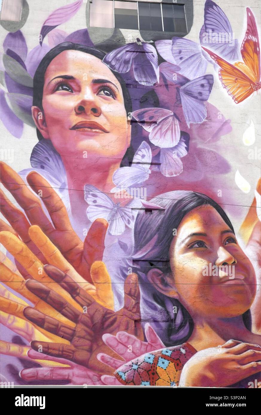 Large mural of woman and girl - Smartphone Captured Stock Image