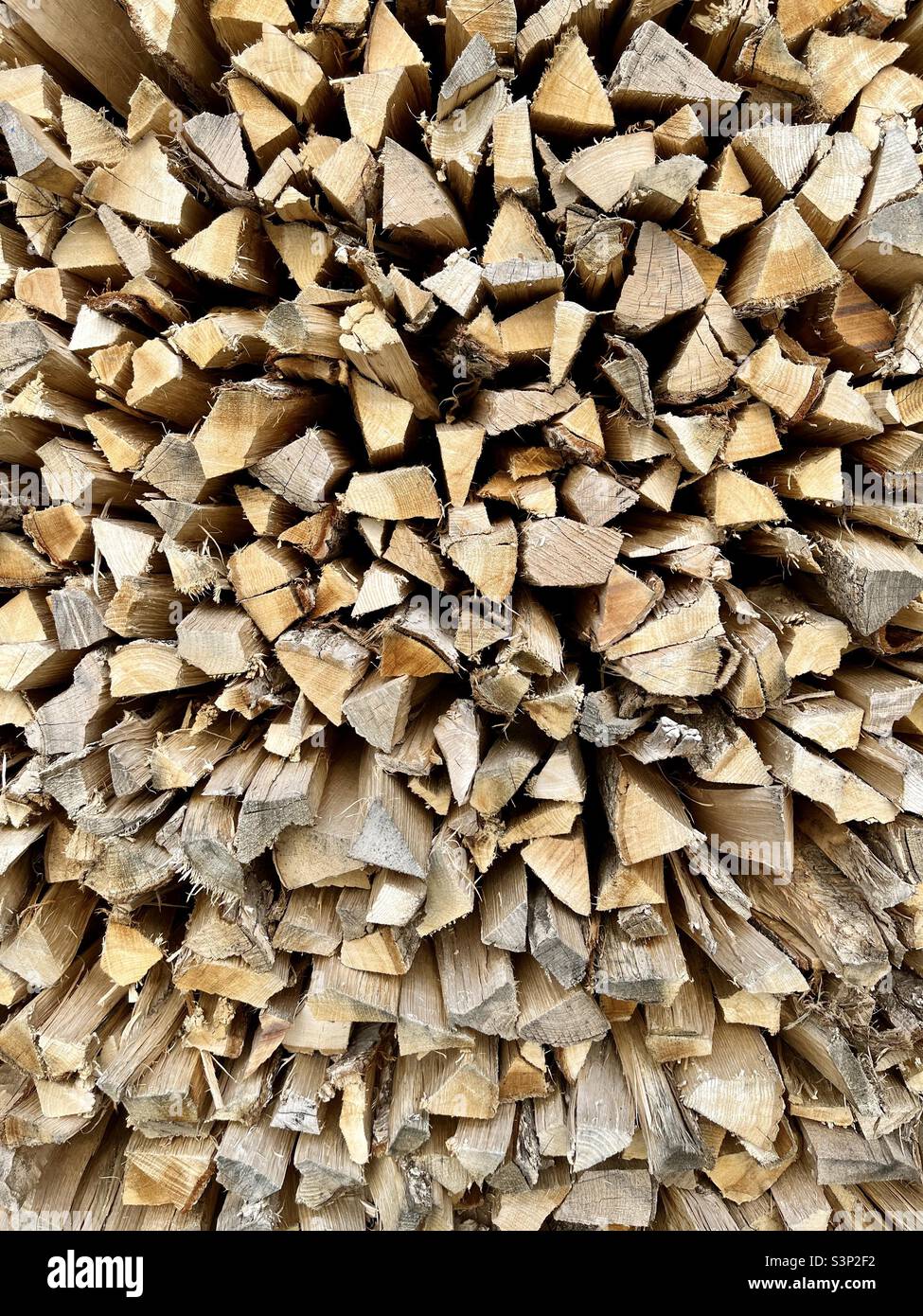 Stack of freshly chopped kindling firewood - Smartphone Captured Stock Image