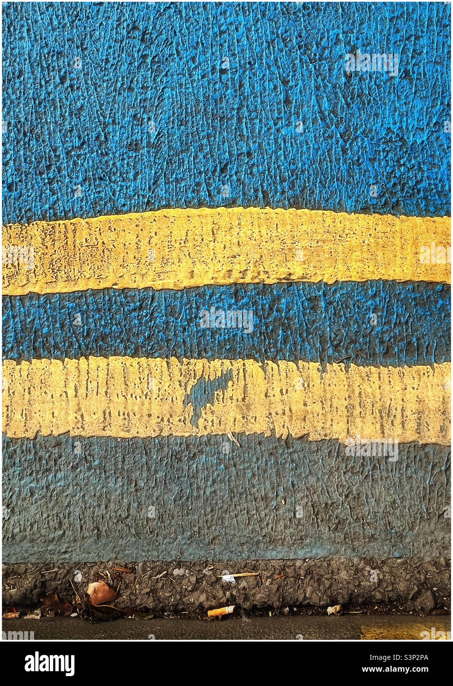 Road markings in the colours of the Ukraine flag - Smartphone Captured Stock Image