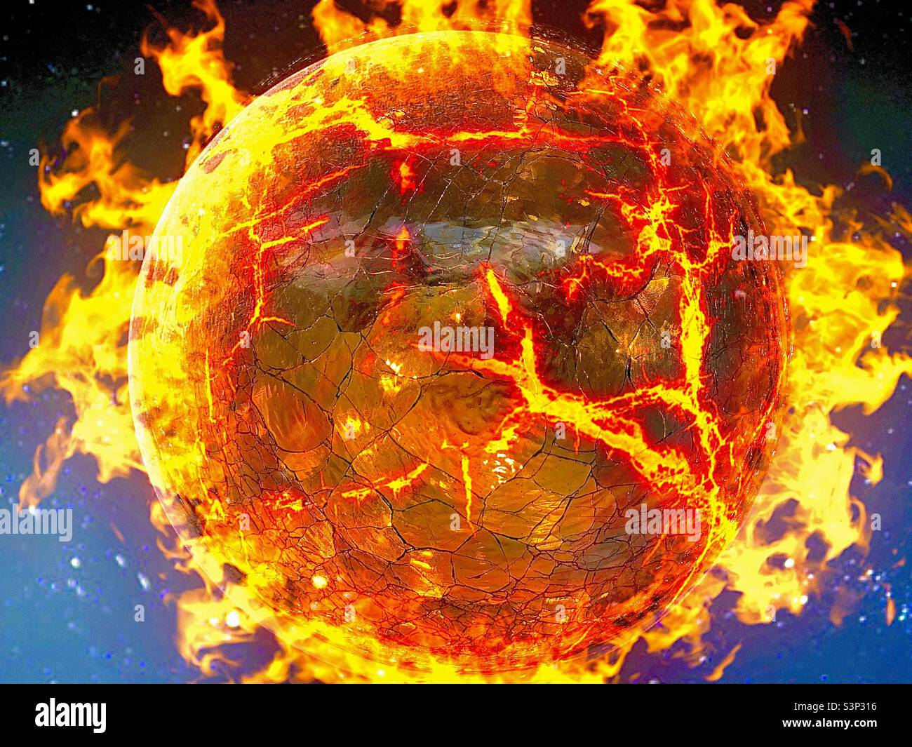 Burning planet was created by altering an iPhone photo of a home decor accent, a cracked glass sphere lighted from within, and then using IOS apps for the flames and red hot effects. - Smartphone Captured Stock Image