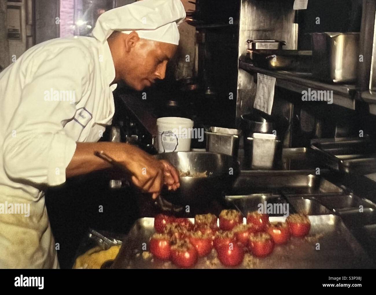 Chef preparing food at New Orlean’s K Paul’s restaurant Stock Photo
