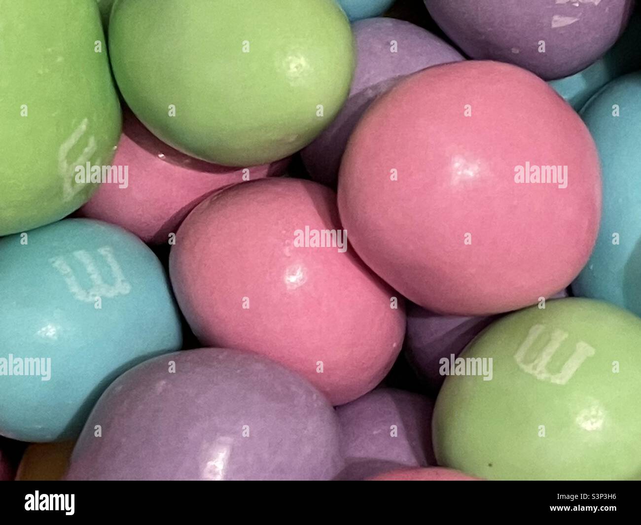 Easter colored M&M peanut candy. - Smartphone Captured Stock Image