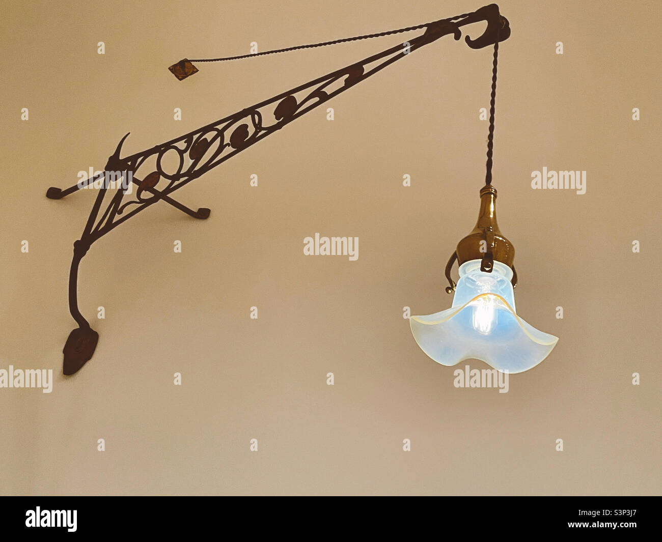 Artwork lamp and chain displayed in a gallery at the Museum of modern Art, 2022, NYC, USA - Smartphone Captured Stock Image