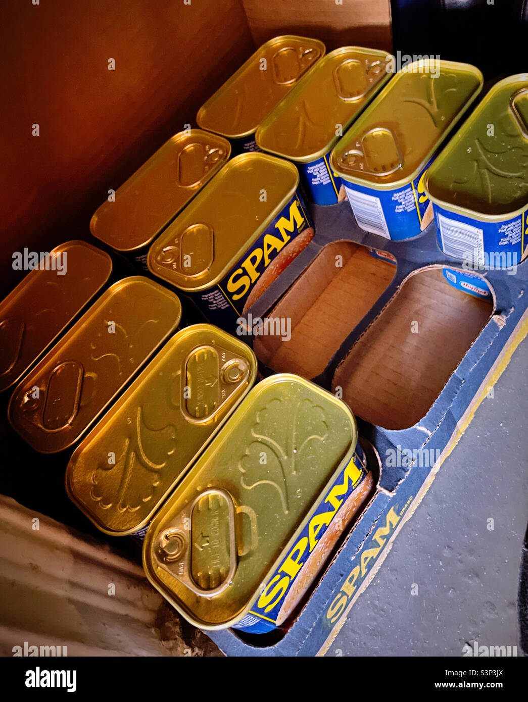 A case of spam luncheon meat tins in a fallout shelter, 2022, USA - Smartphone Captured Stock Image