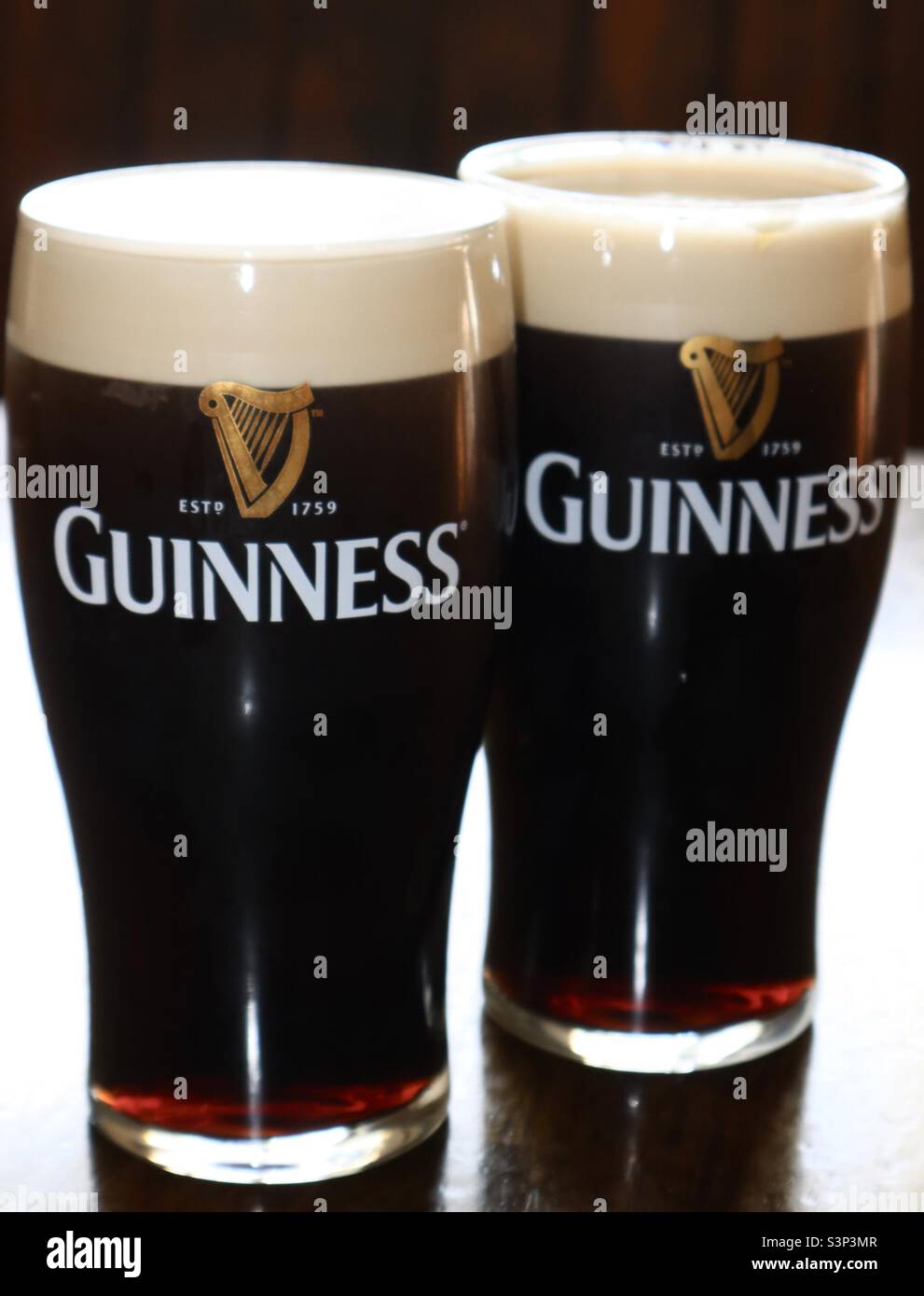 Two pints of Guinness Stock Photo Alamy