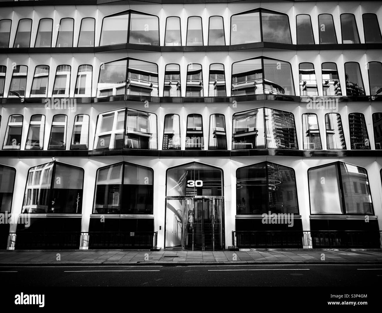 Modern building at 30 Cannon Street London in black and white - Smartphone Captured Stock Image
