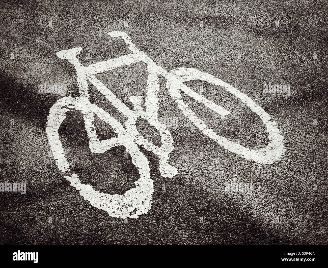 This area is designated for bicycles. The universal sign for a cycle lane. Photo Credit- ©️ COLIN HOSKINS. - Smartphone Captured Stock Image