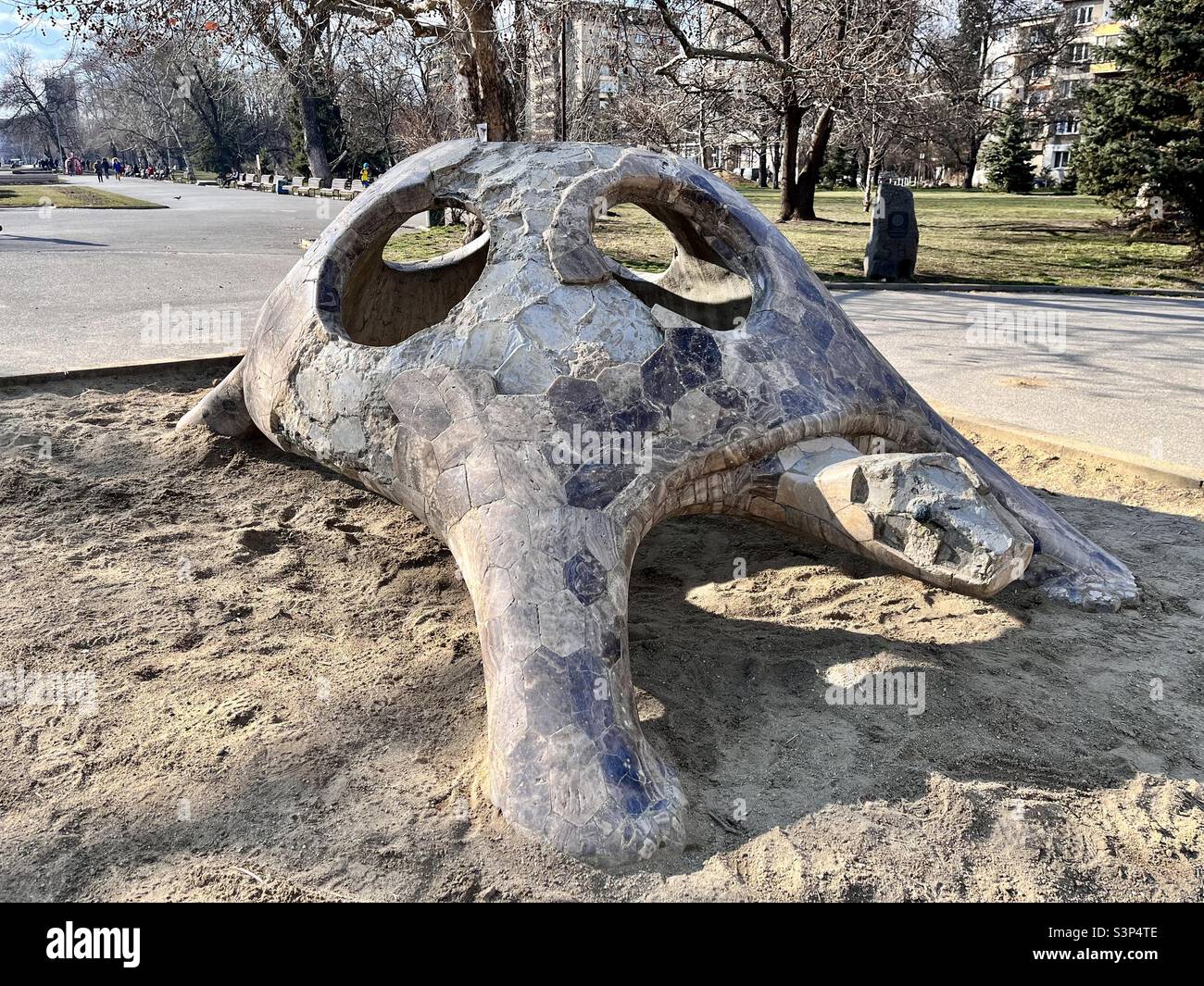 Tortoise feature at children sandbox playground in downtown Sofia, Bulgaria - Smartphone Captured Stock Image