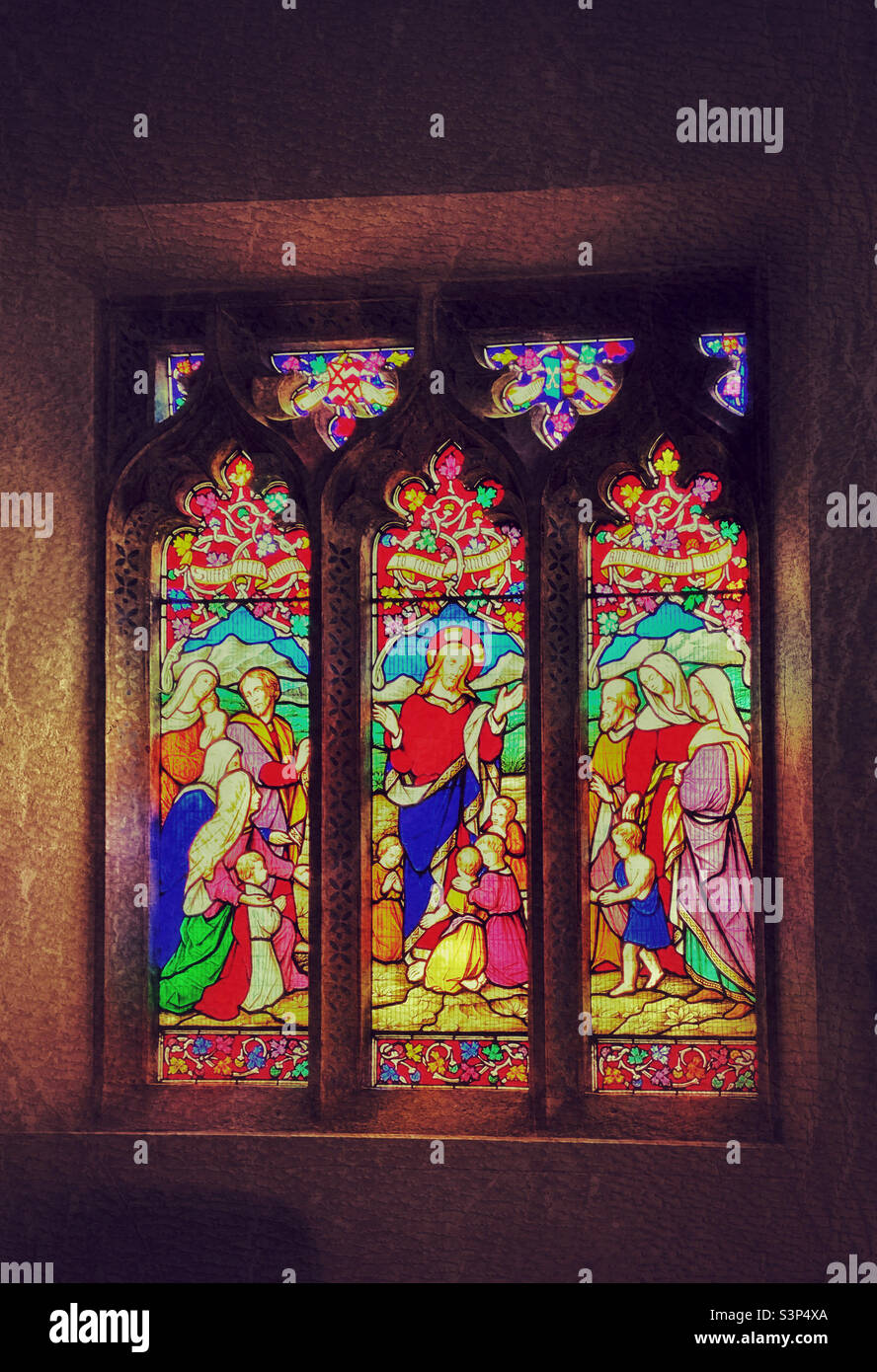 A creative effect image of a stained glass window in a small parish church in the south of England. The glass pictures feature Jesus Christ, the saviour of all Christians. Photo ©️ COLIN HOSKINS. - Smartphone Captured Stock Image