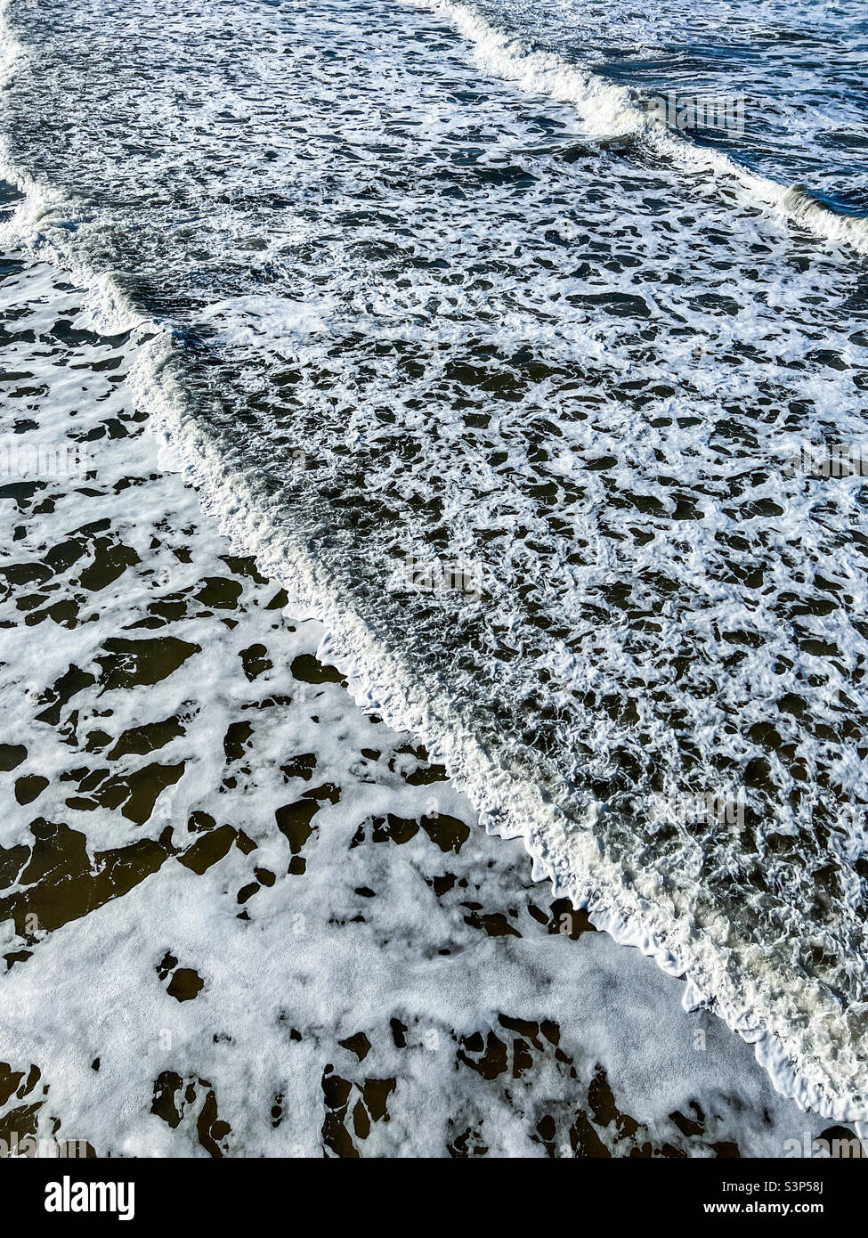 Waves crossing in the North Sea in Whitby North Yorkshire - Smartphone Captured Stock Image