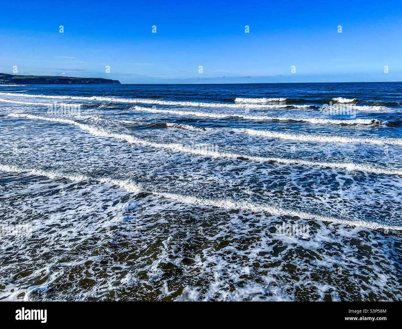 Waves crossing in the North Sea in Whitby North Yorkshire - Smartphone Captured Stock Image