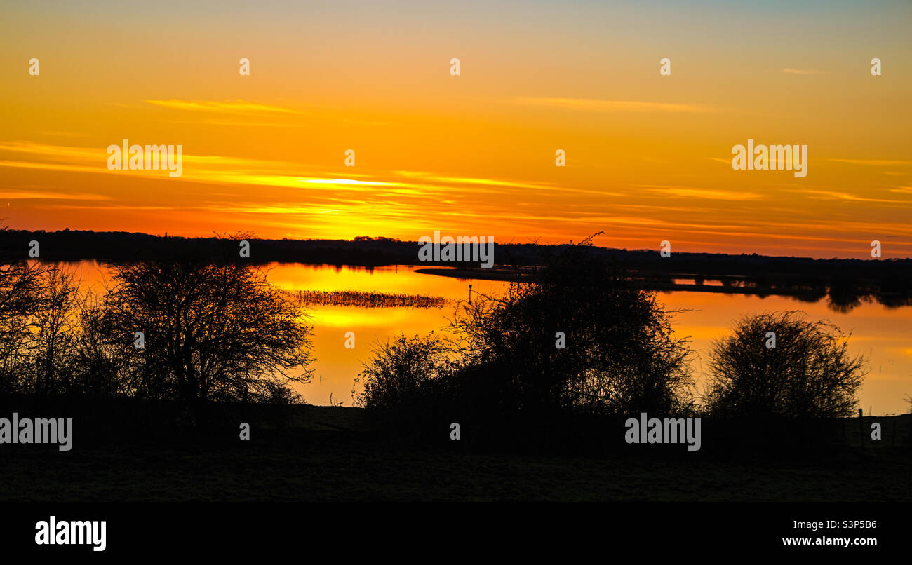 Sunset on Clonmacnoise lake Stock Photo - Alamy