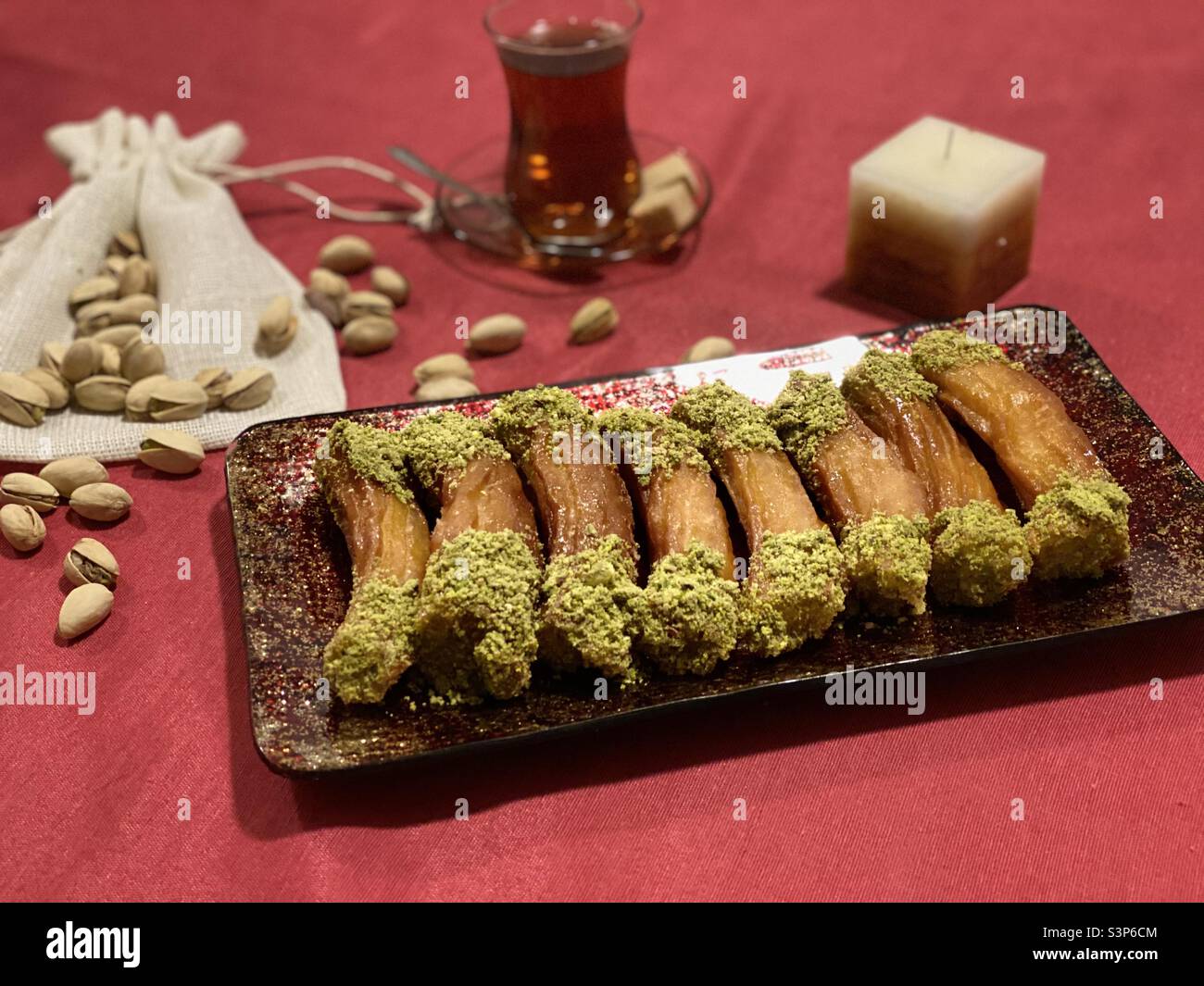 Tulumba turkish delight with pistachio Stock Photo