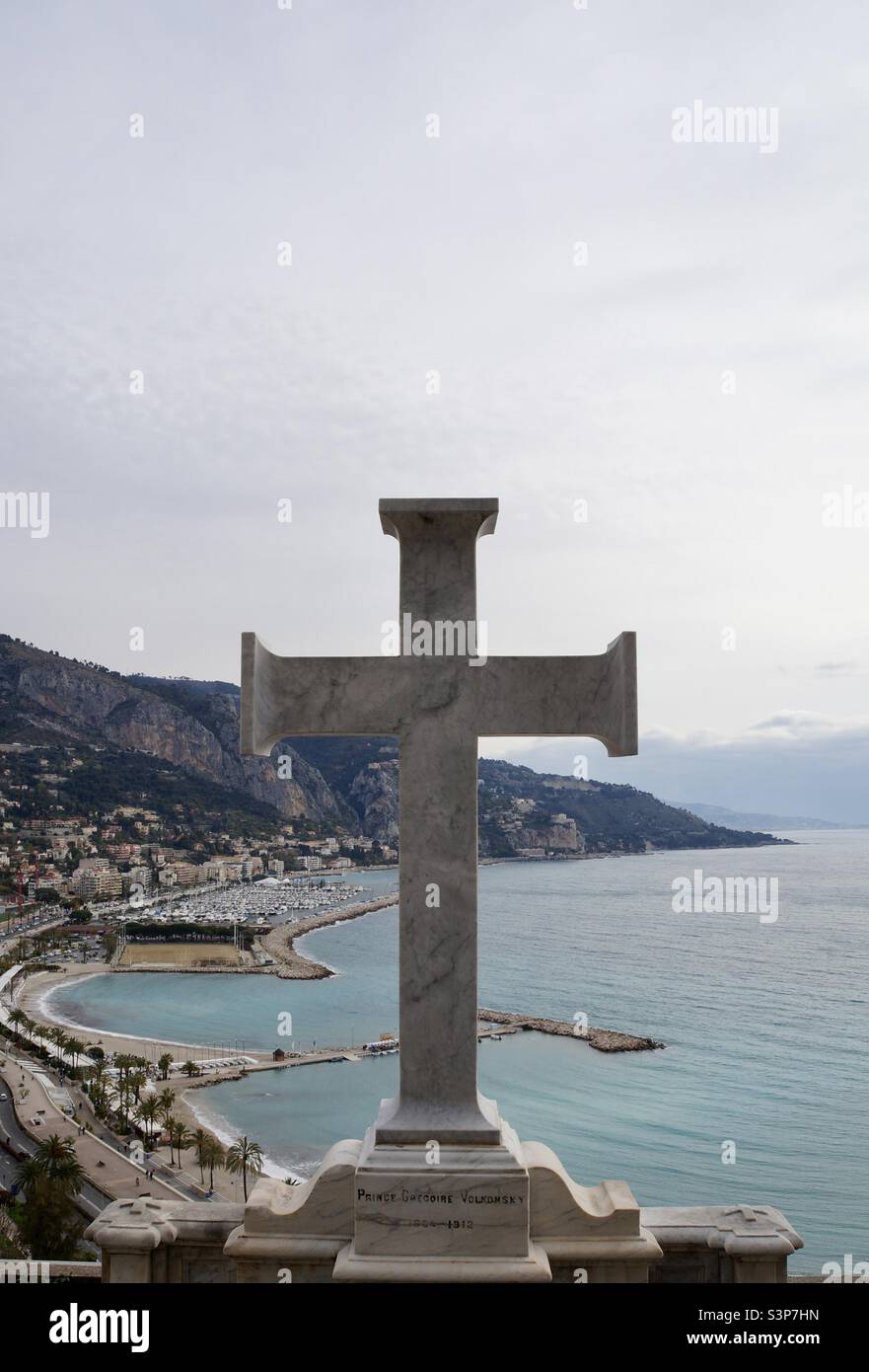 The cross gracing the burial site of Prince Gregoire Volkonsky in the old cemetery above Menton France. - Smartphone Captured Stock Image