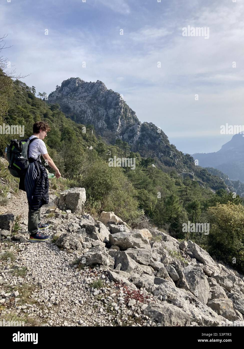 Checking out our progress on our hike from Gorbio to Saint Agnes in the French Alps. Stock Photo
