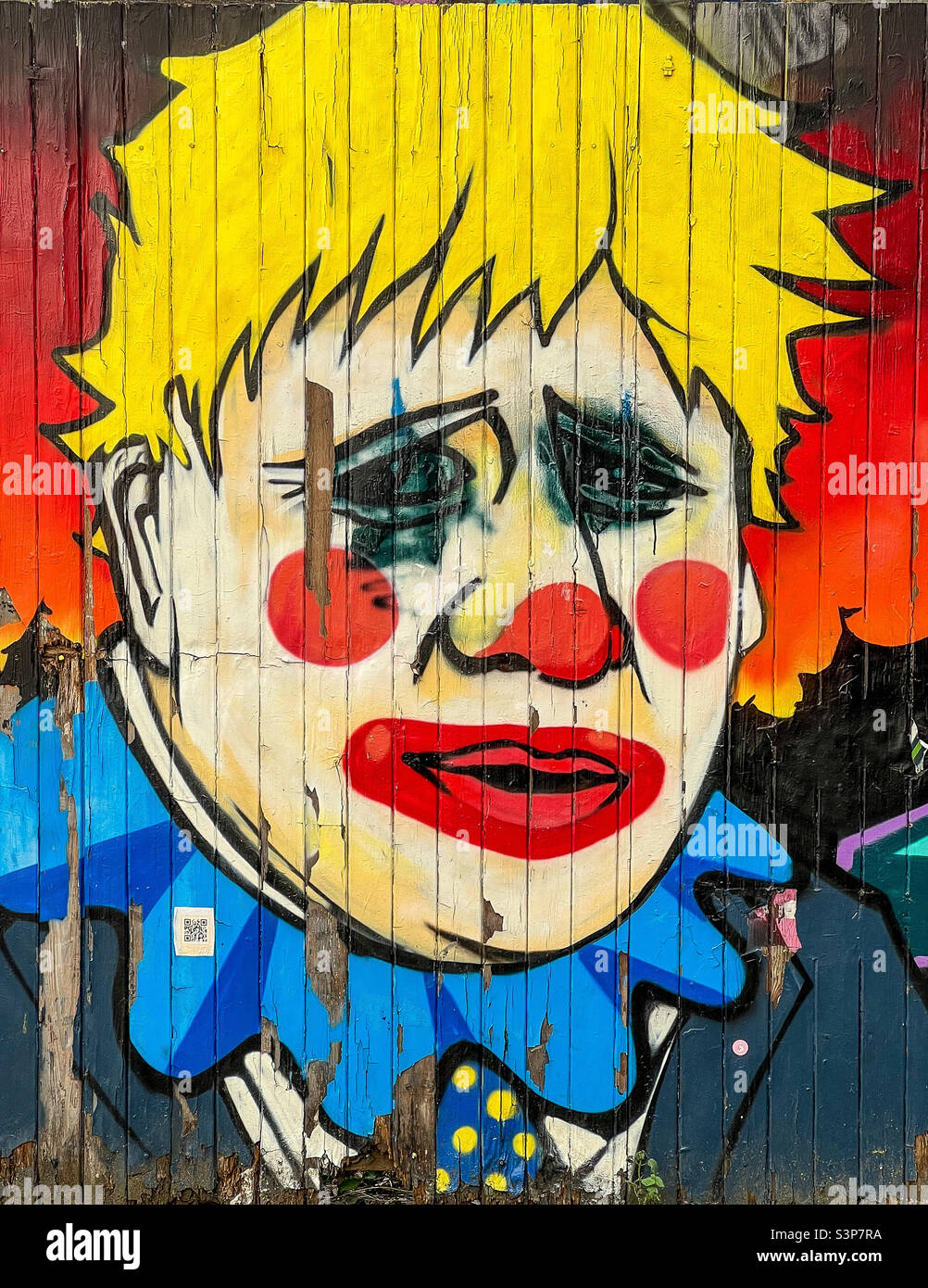 Graffiti Art work image of Prime Minister Boris Johnson, Shoreditch, London March 2022. Stock Photo