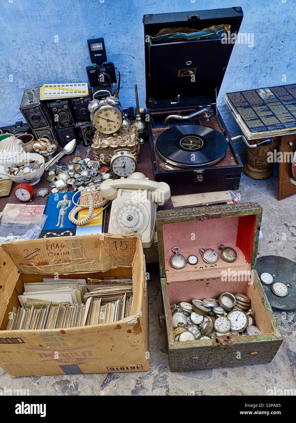 Antique vendor at the Chefchaouen market in northern Morocco. - Smartphone Captured Stock Image