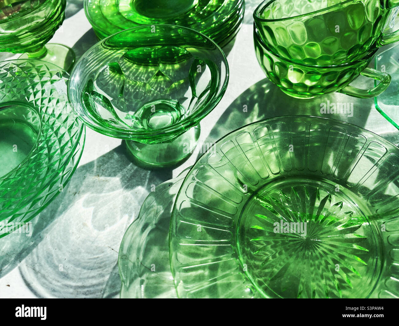 Green Depression glass pieces Stock Photo