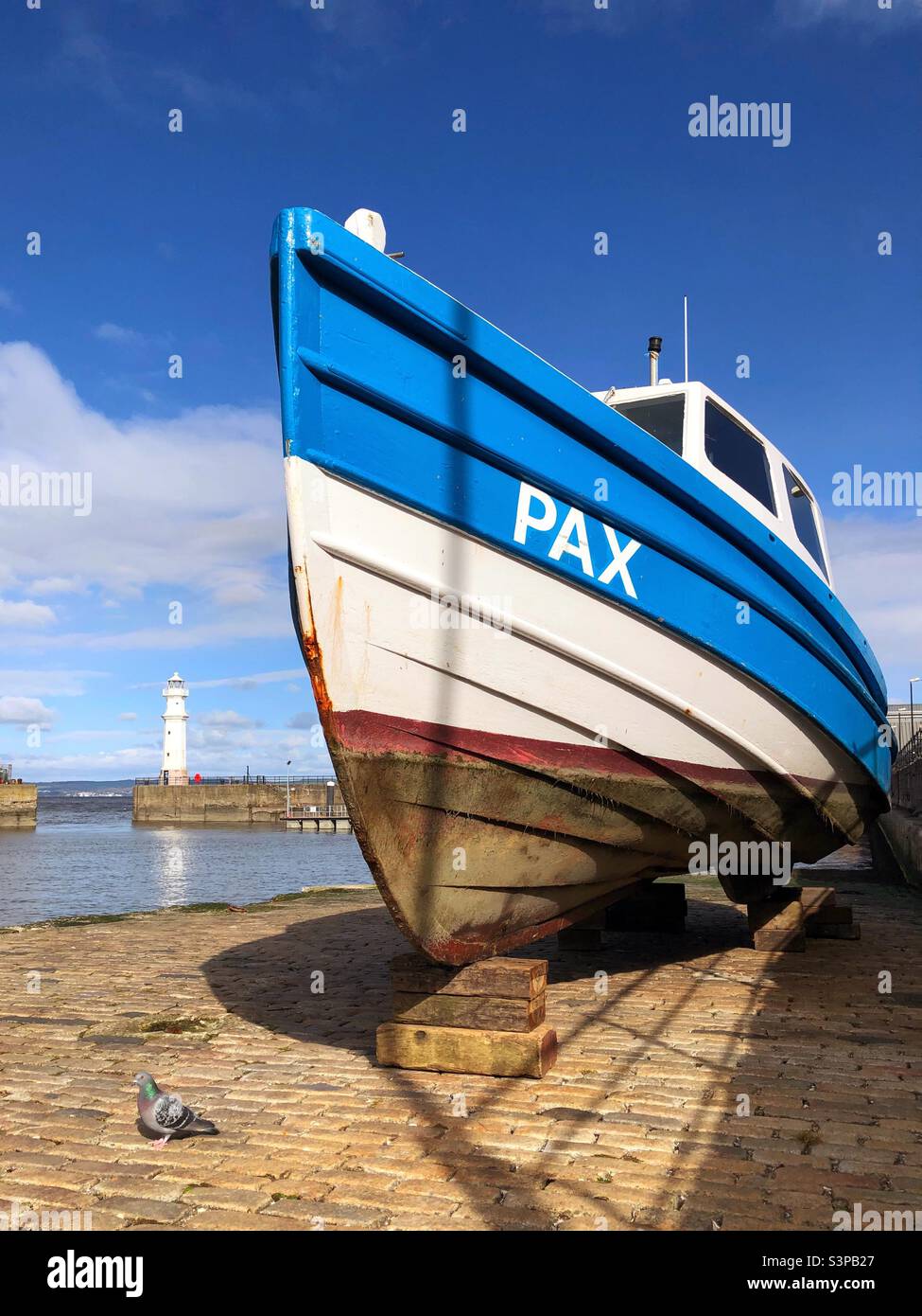 Boat on the slipway at Newhaven harbour, Edinburgh Stock Photo